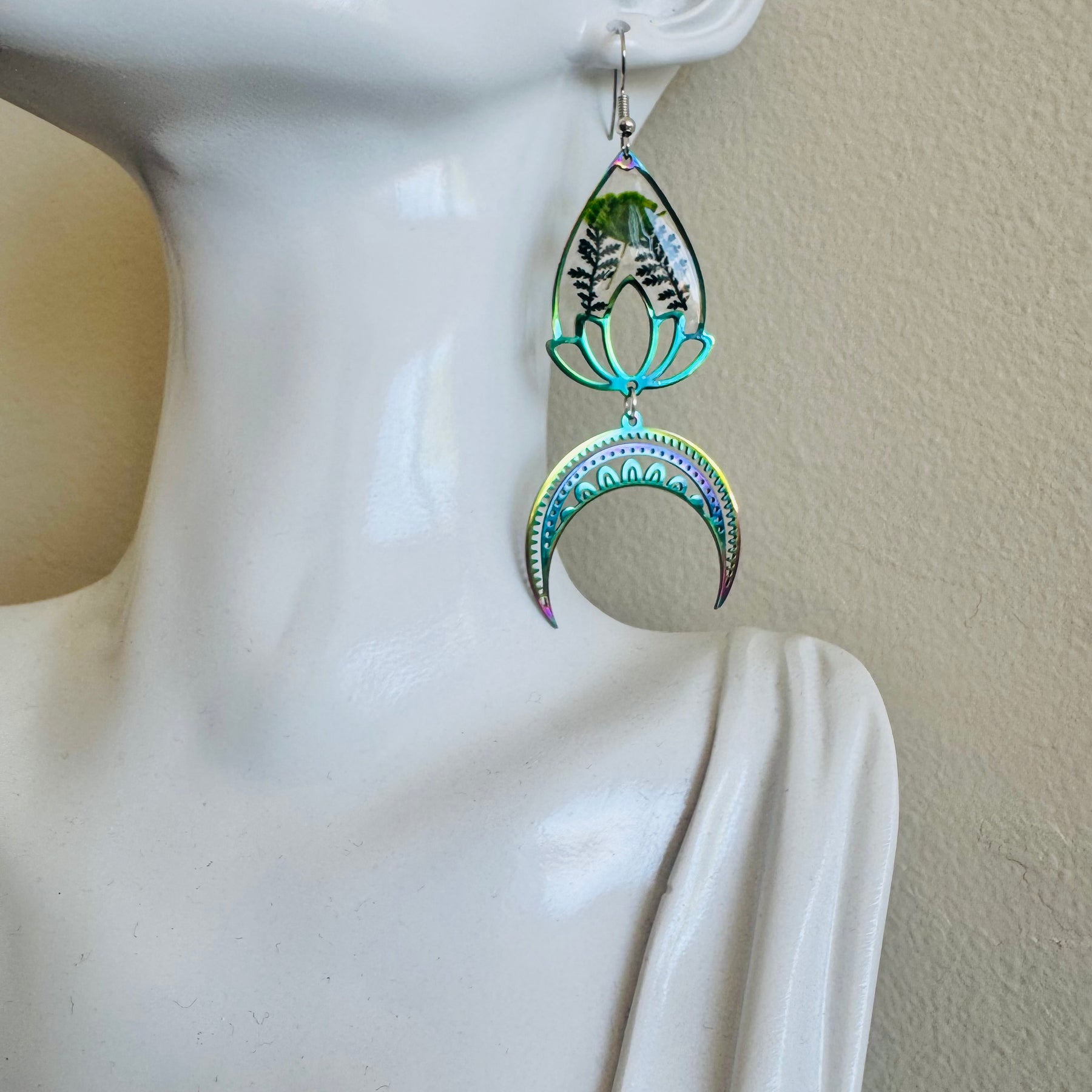 Iridescent rainbow resin earrings with pressed flowers