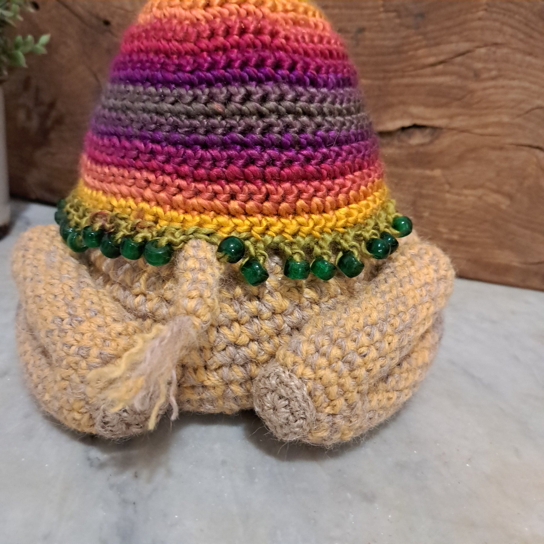 Handmade crochet camel doorstop colourful coat mustard coloured base