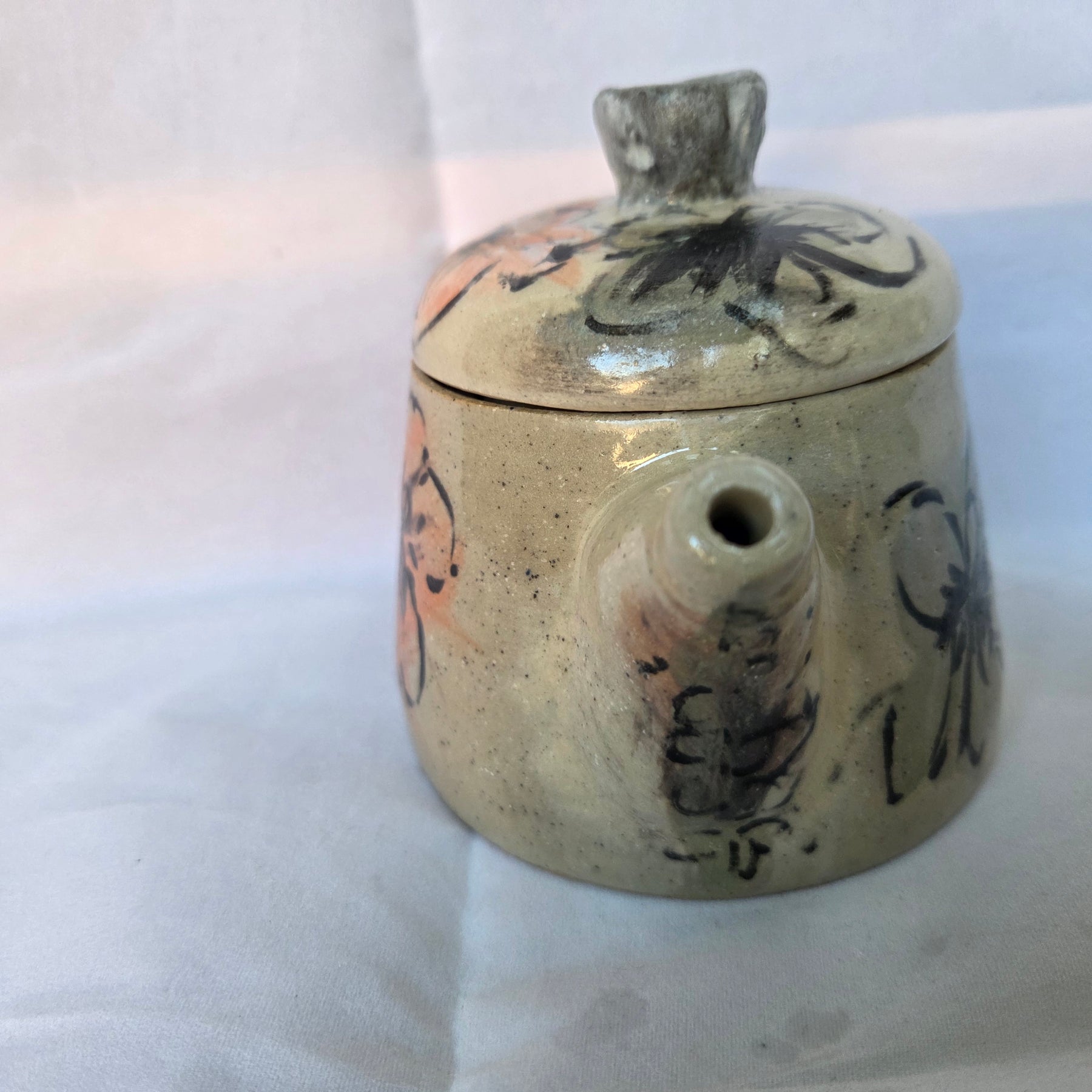 Small Japanese inspired ceramic One cup tea pot. Hand painted floral design. 10 x 9.5cm