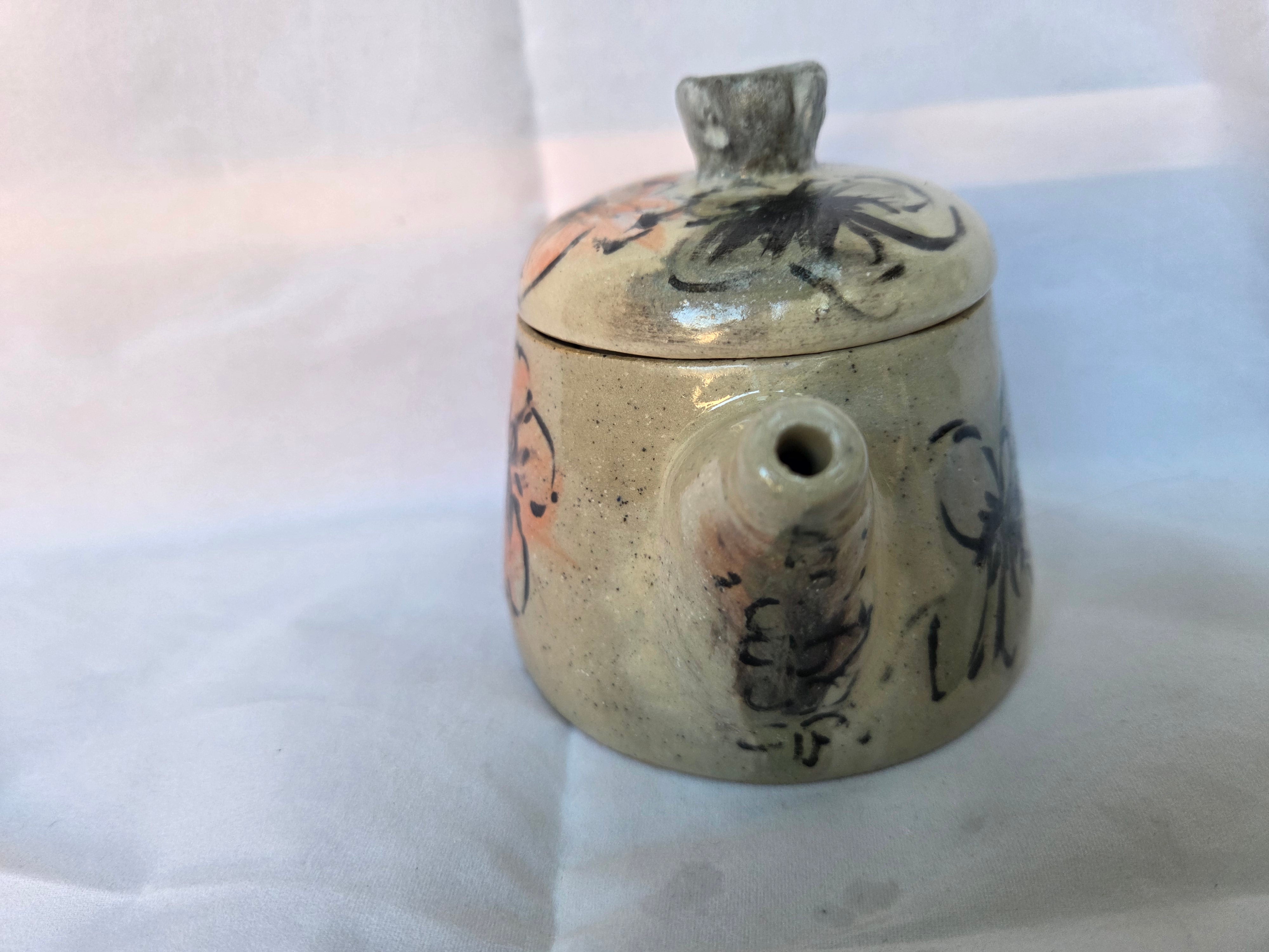 Small Japanese inspired ceramic One cup tea pot. Hand painted floral design. 10 x 9.5cm