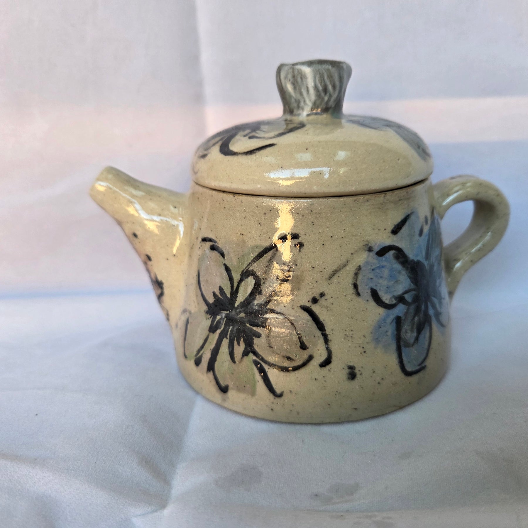 Small Japanese inspired ceramic One cup tea pot. Hand painted floral design. 10 x 9.5cm