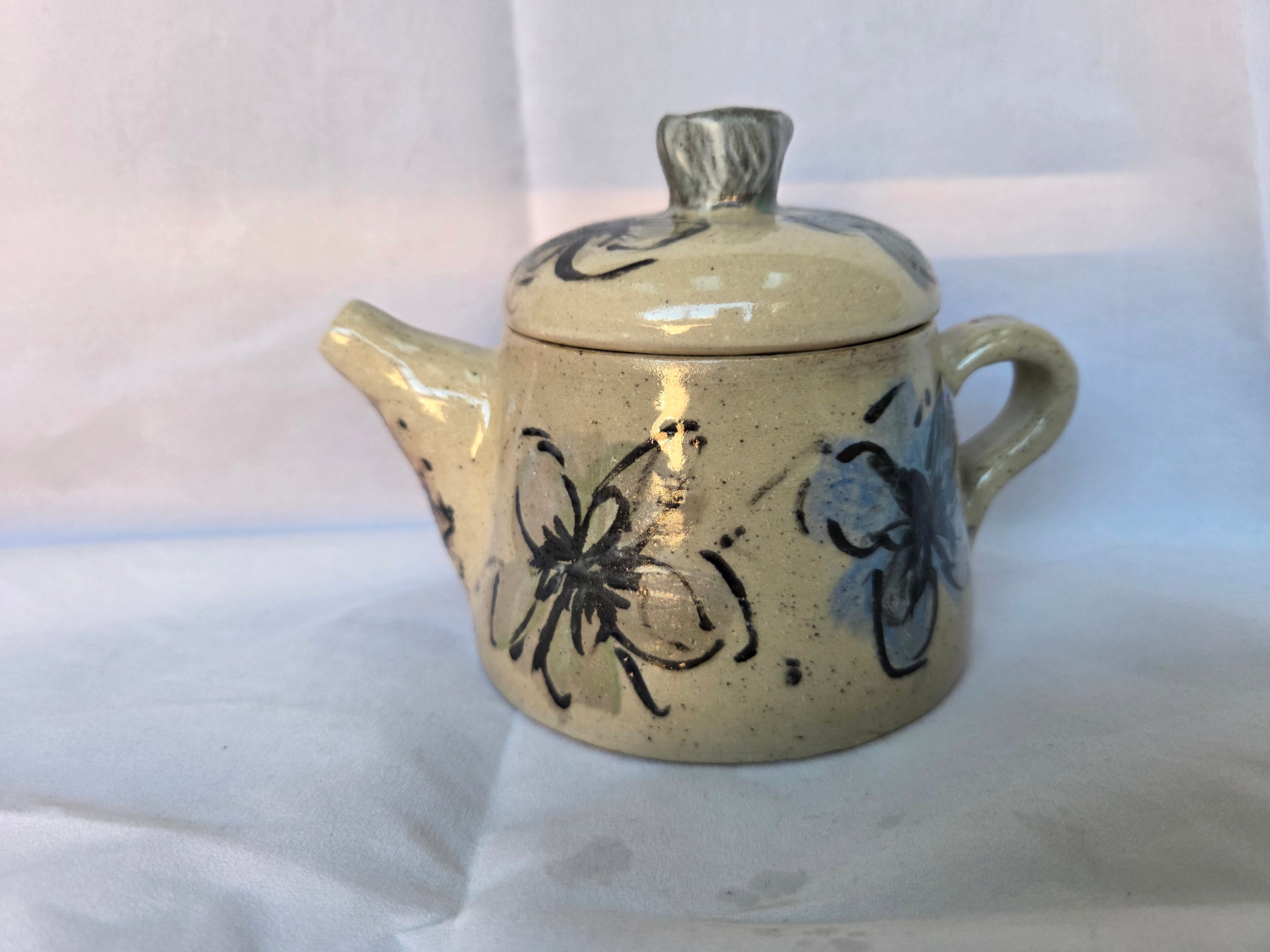 Small Japanese inspired ceramic One cup tea pot. Hand painted floral design. 10 x 9.5cm