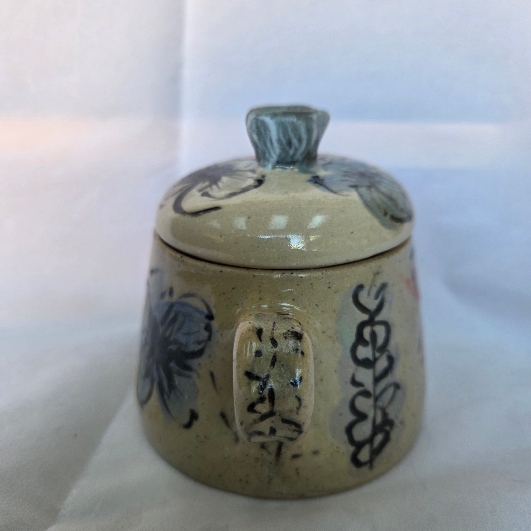 Small Japanese inspired ceramic One cup tea pot. Hand painted floral design. 10 x 9.5cm