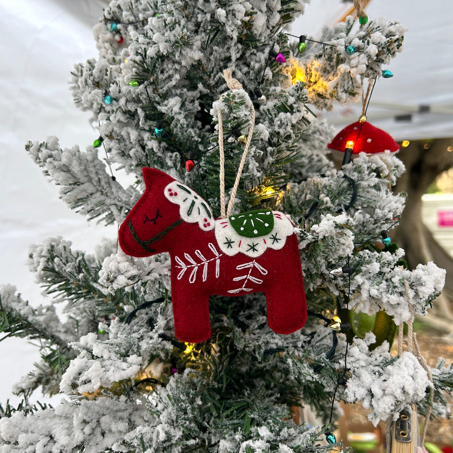 Scandinavian-inspired Dala horse ornament, hand embroidered for timeless holiday charm