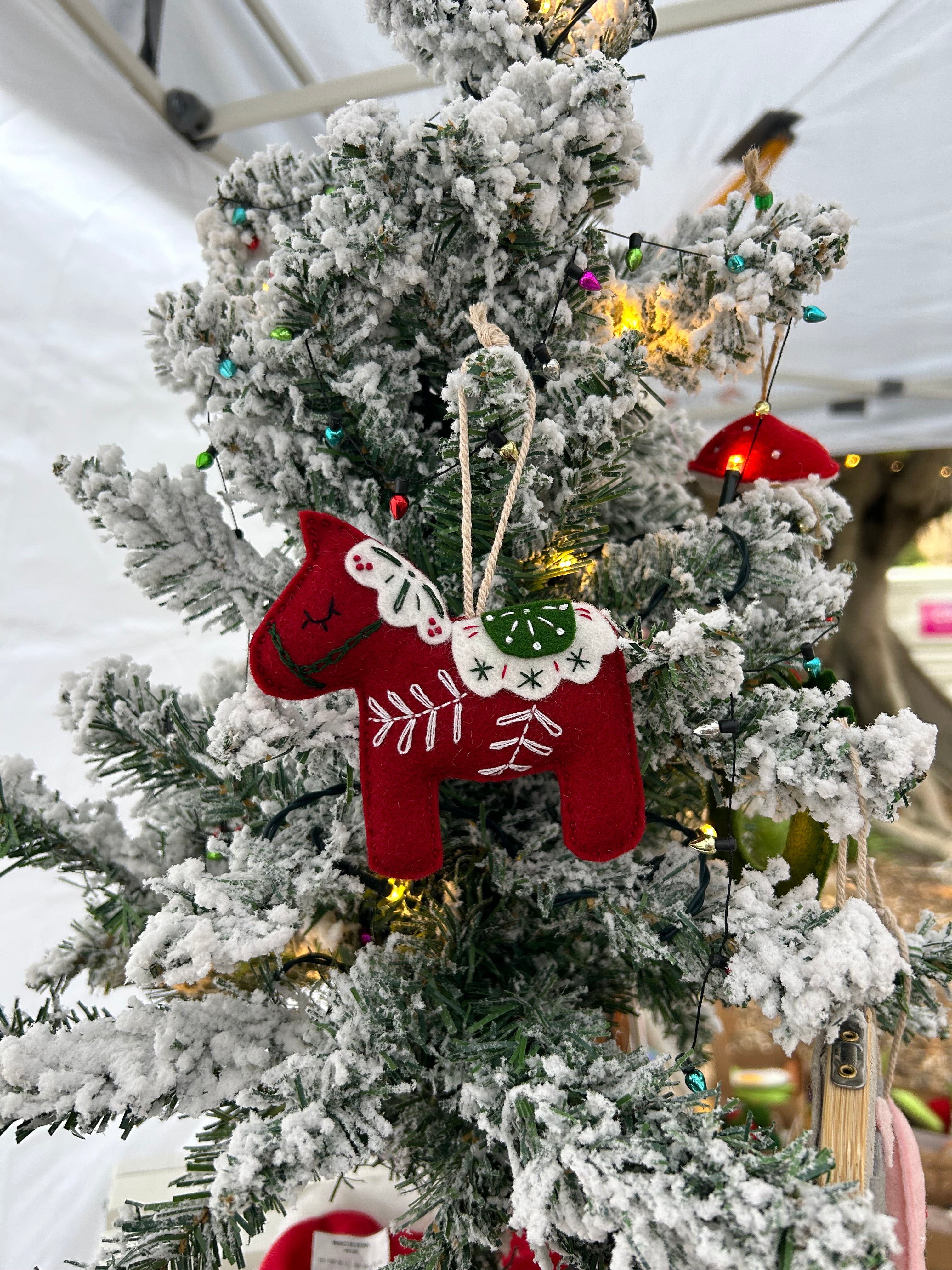 Scandinavian-inspired Dala horse ornament, hand embroidered for timeless holiday charm