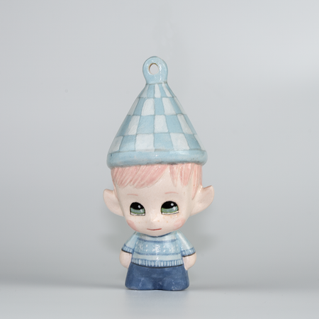 Handmade Porcelain Christmas ornament. One-of-a-kind. Sally, the Christmas Sweater designer Elf.