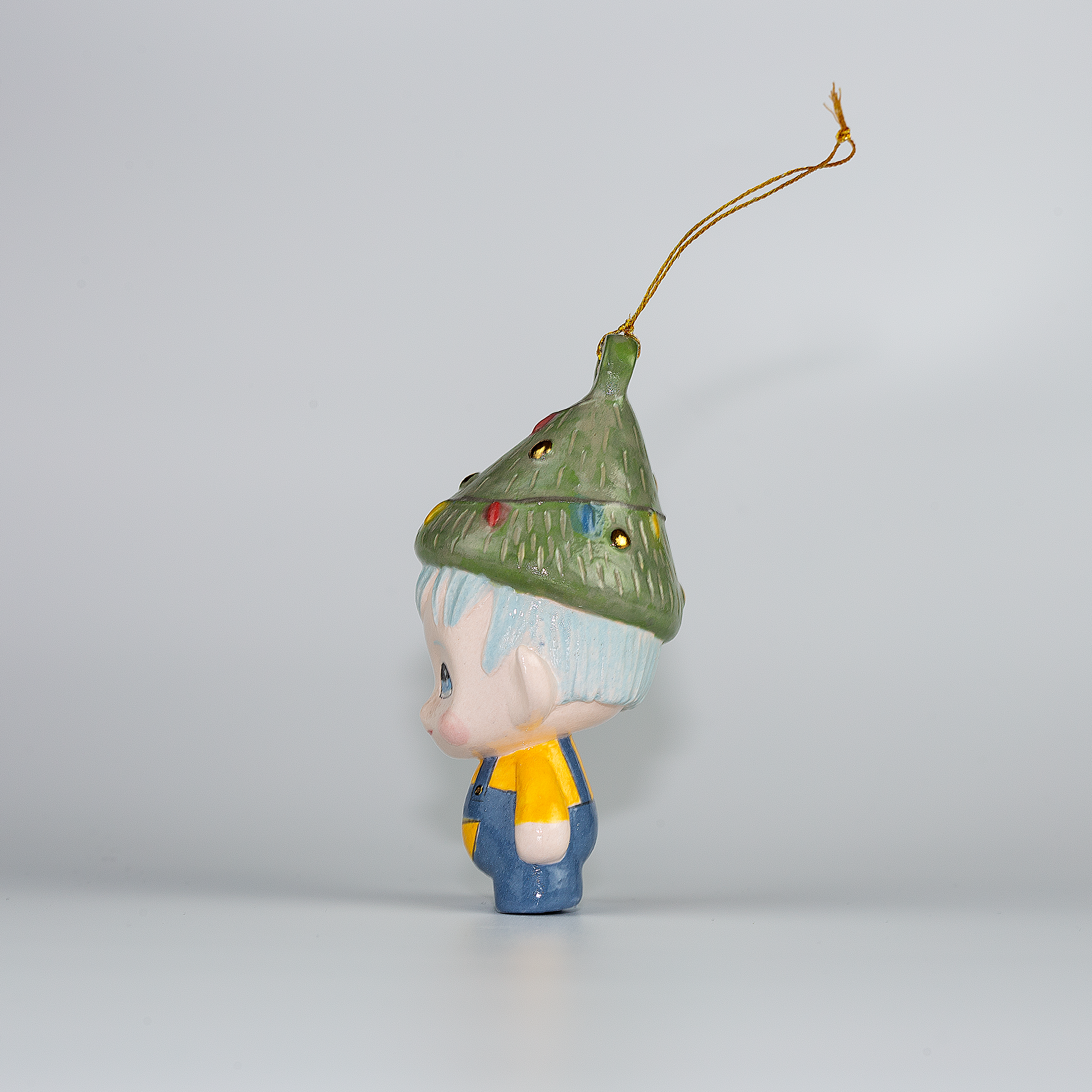 Handmade Porcelain Christmas ornament. One-of-a-kind. Jolli, the Christmas Cheer Elf.