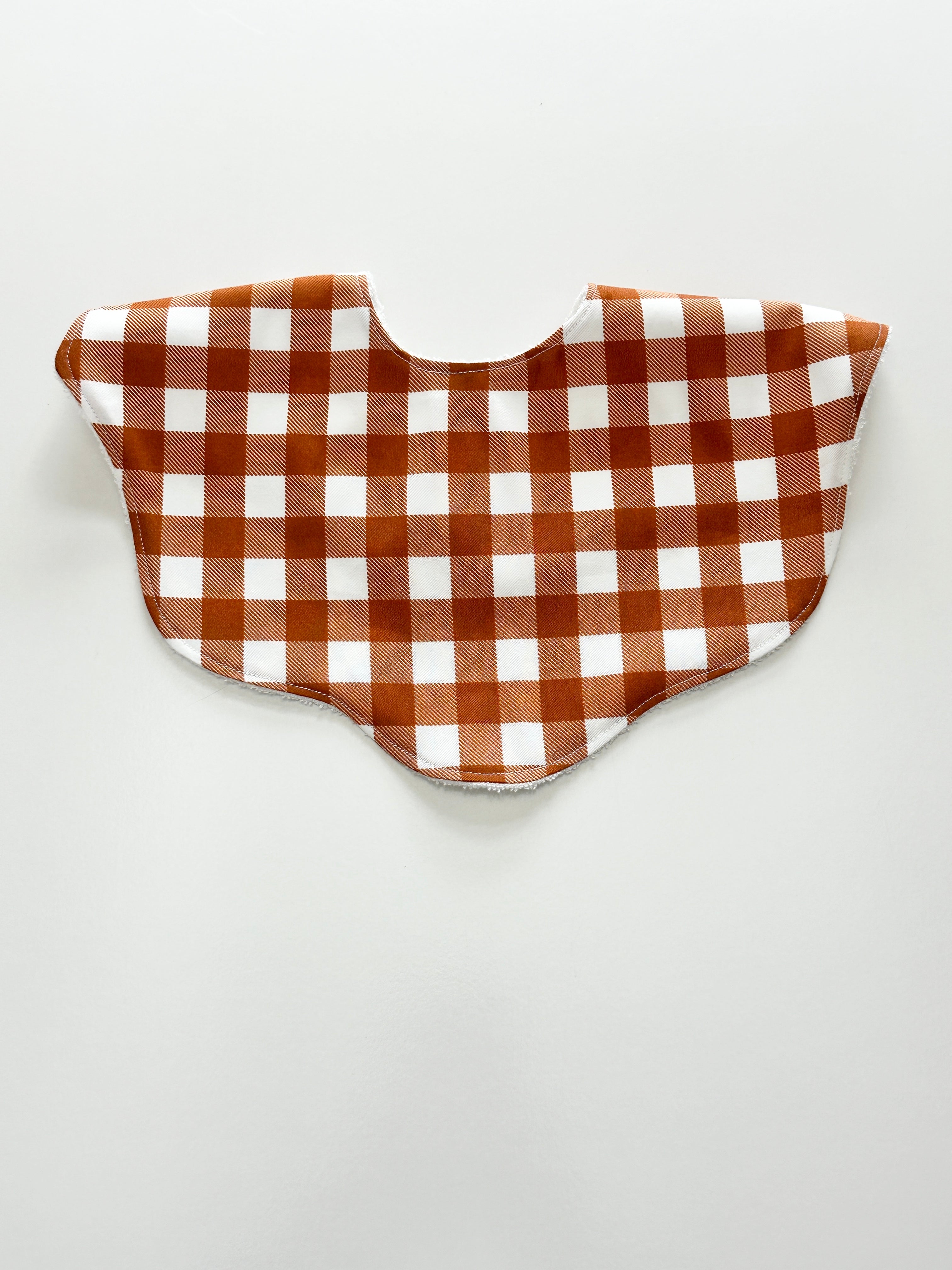 Rust gingham scalloped bib