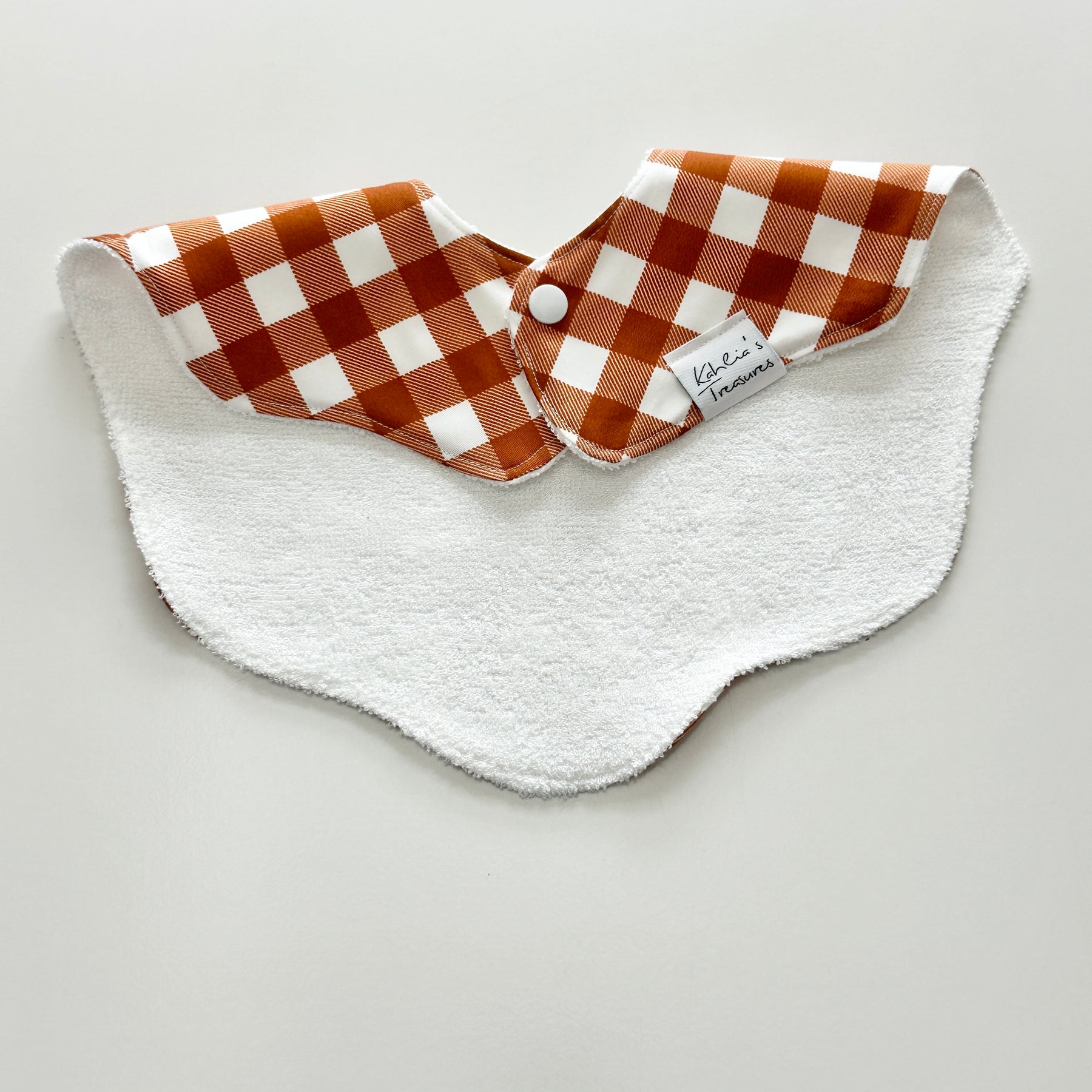Rust gingham scalloped bib