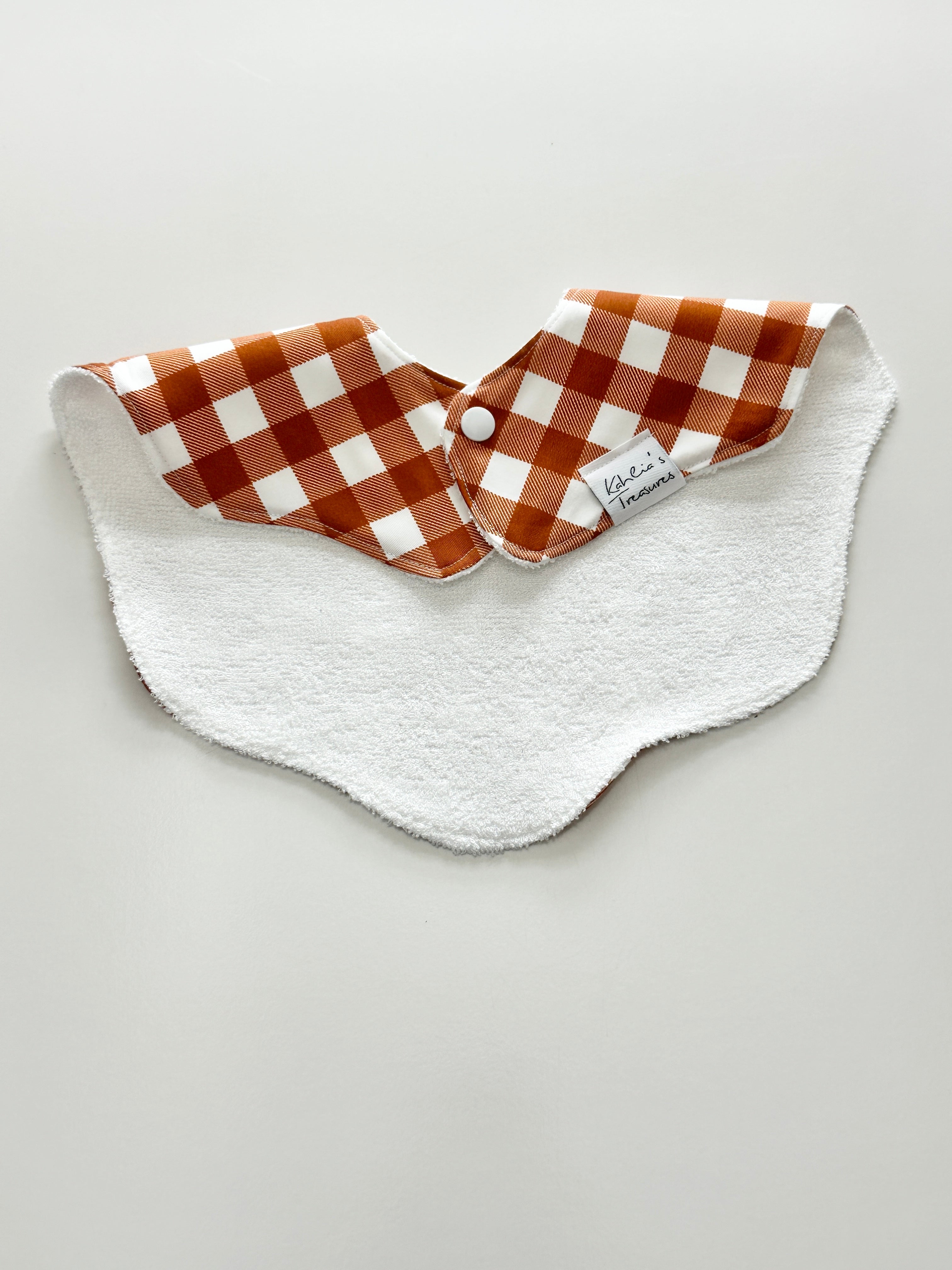 Rust gingham scalloped bib