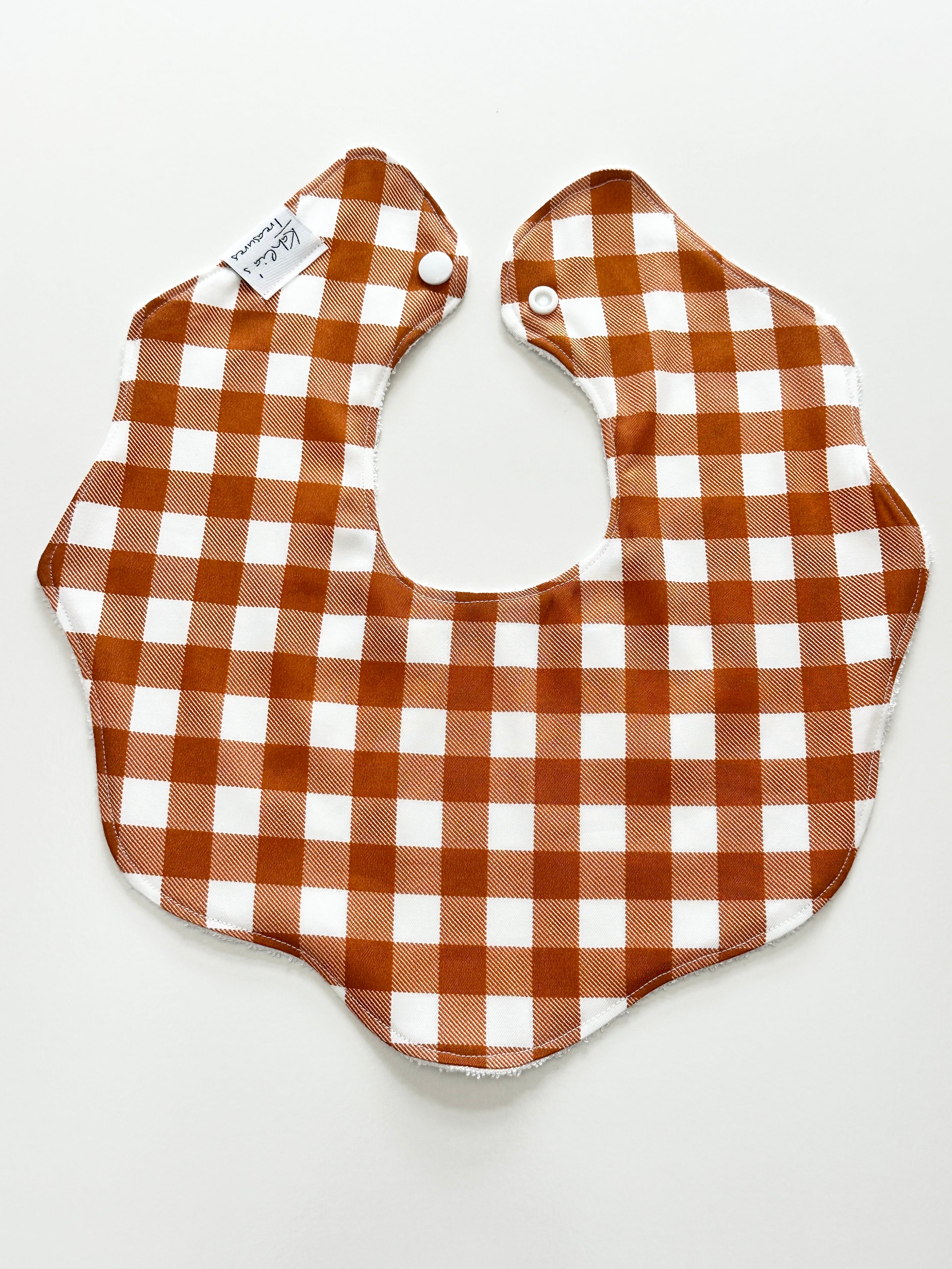 Rust gingham scalloped bib