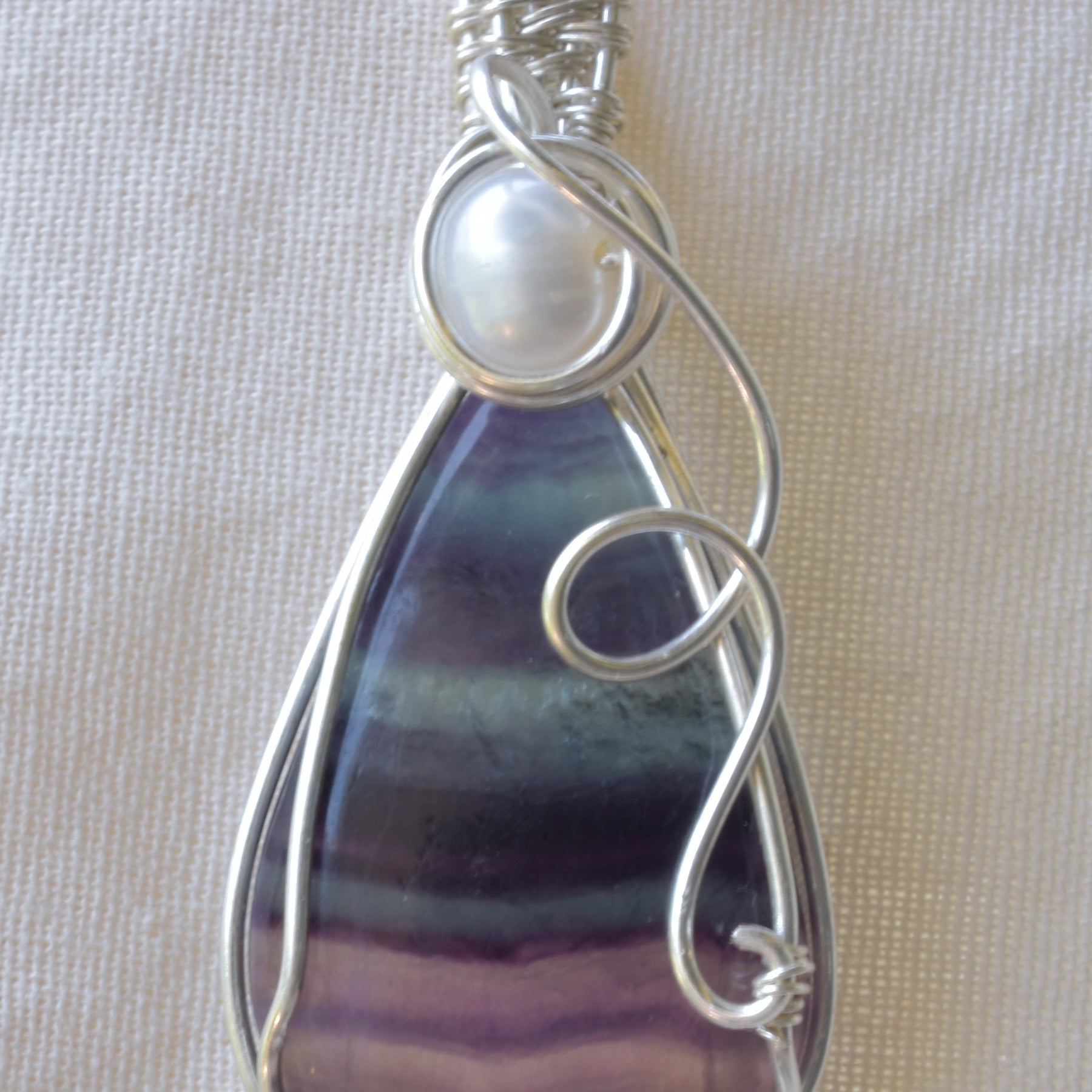 Luminous Balance – Rainbow Fluorite & Pearl Wire Wrapped Pendant