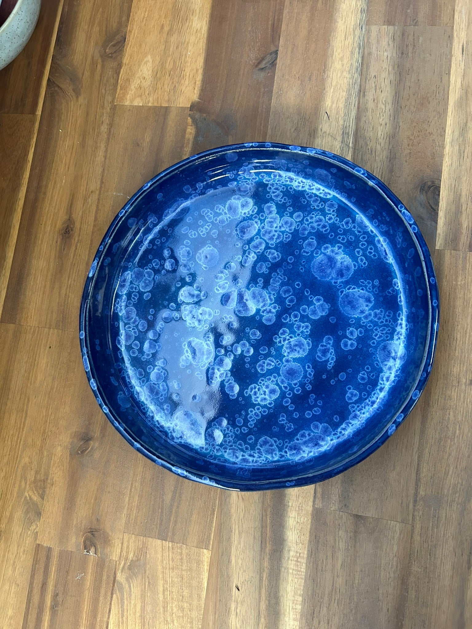 Handcrafted cosmic blue pottery serving bowl