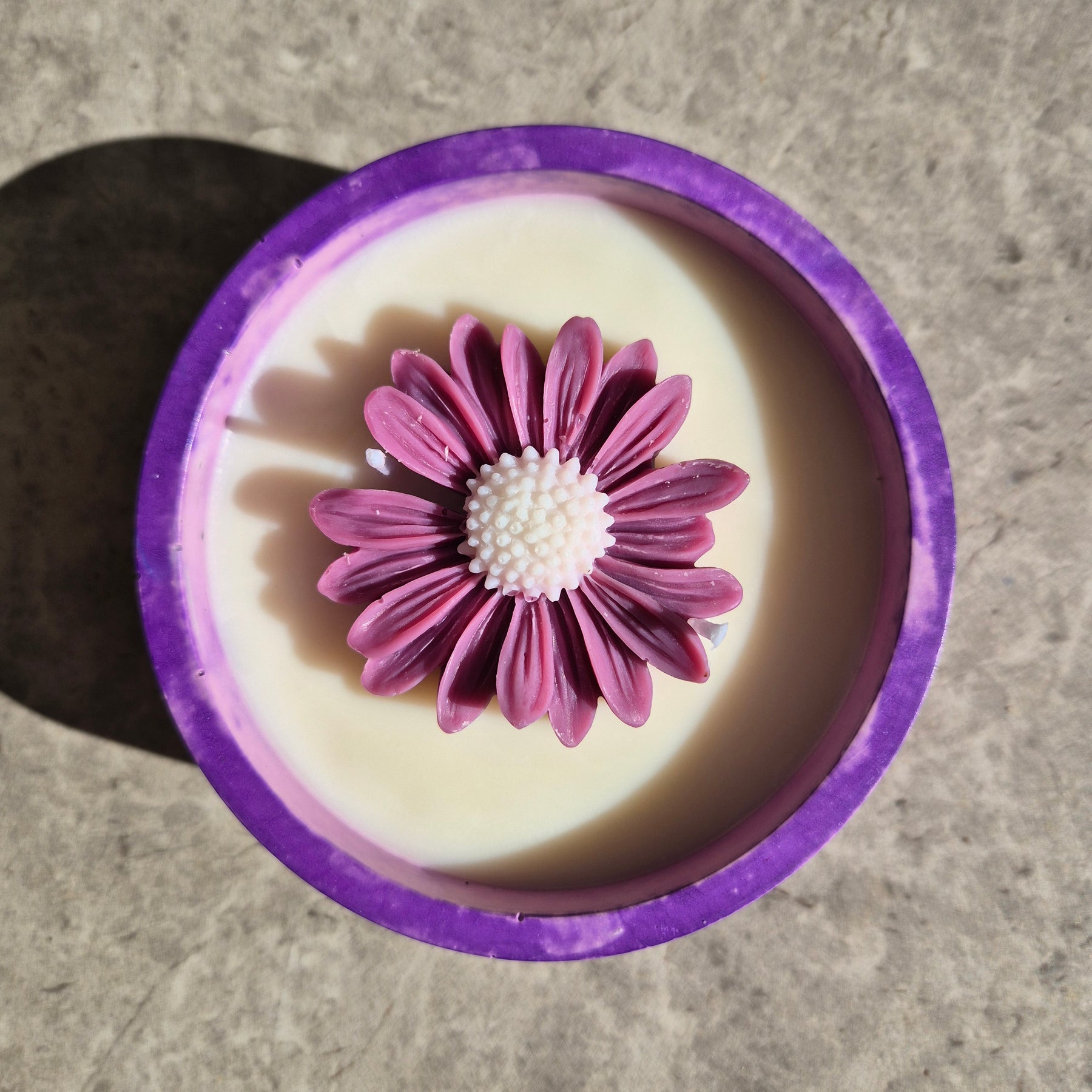 Round purple concrete bowl candle with rose soy wax daisy