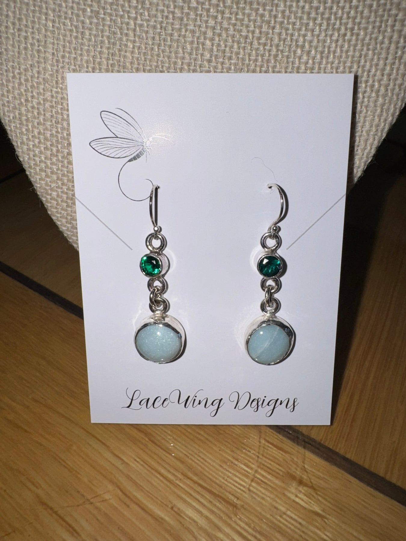 Sterling silver earrings featuring lab-created emeralds and amazonite