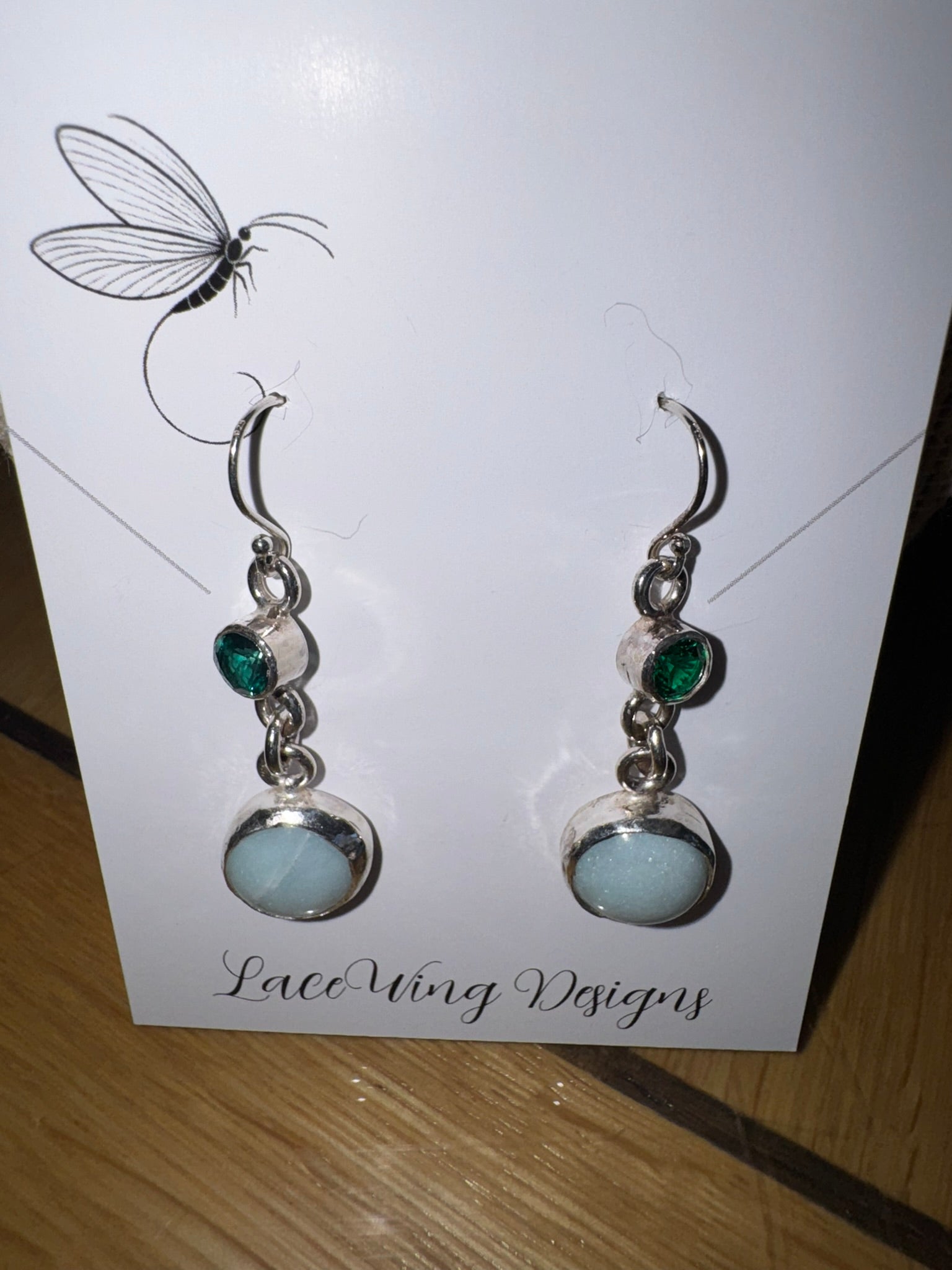 Sterling silver earrings featuring lab-created emeralds and amazonite
