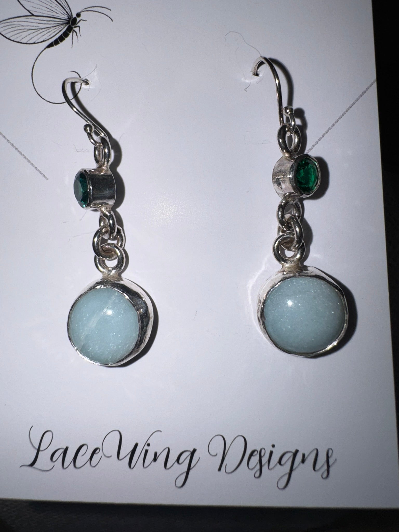 Sterling silver earrings featuring lab-created emeralds and amazonite