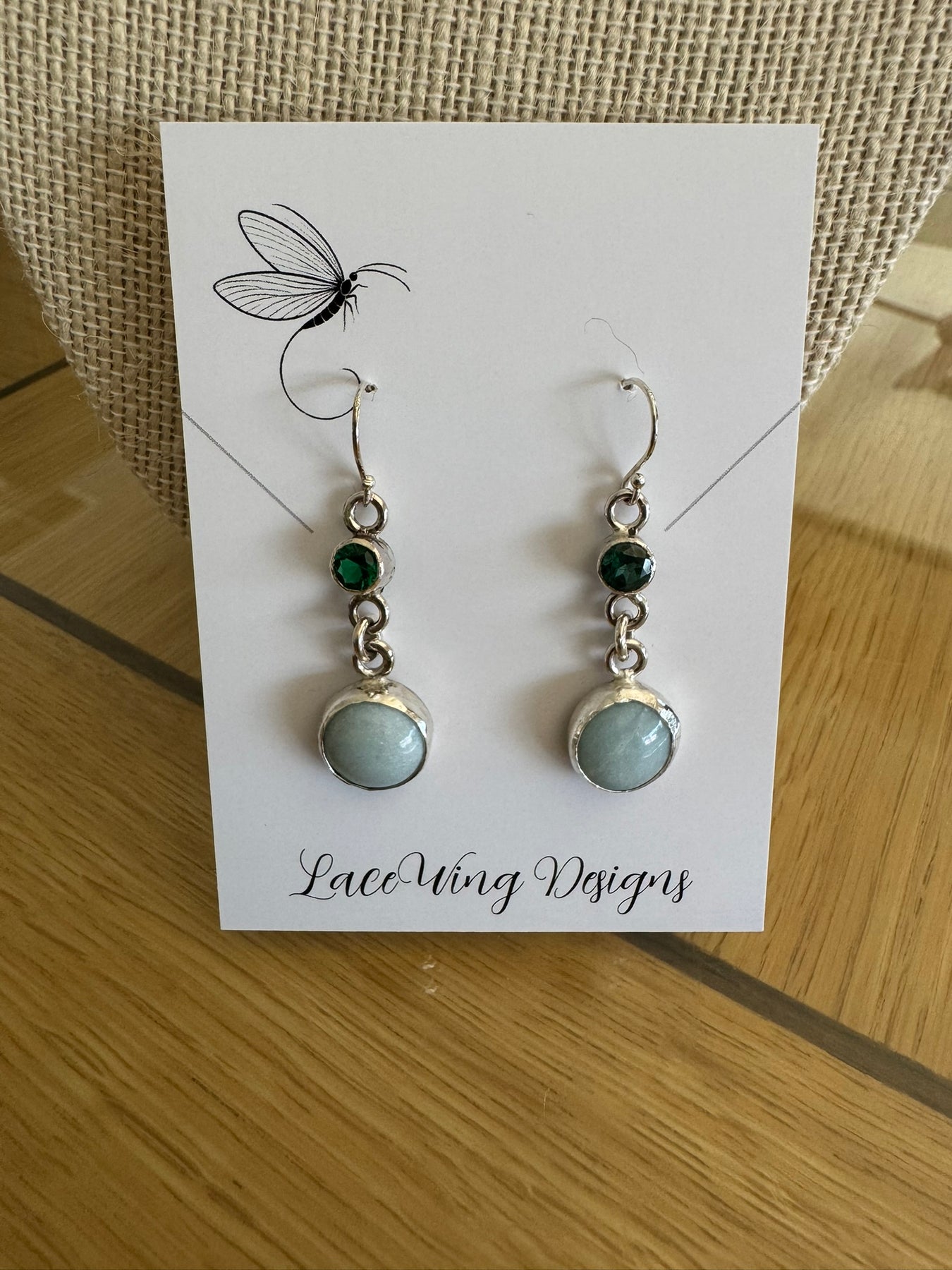Sterling silver earrings featuring lab-created emeralds and amazonite