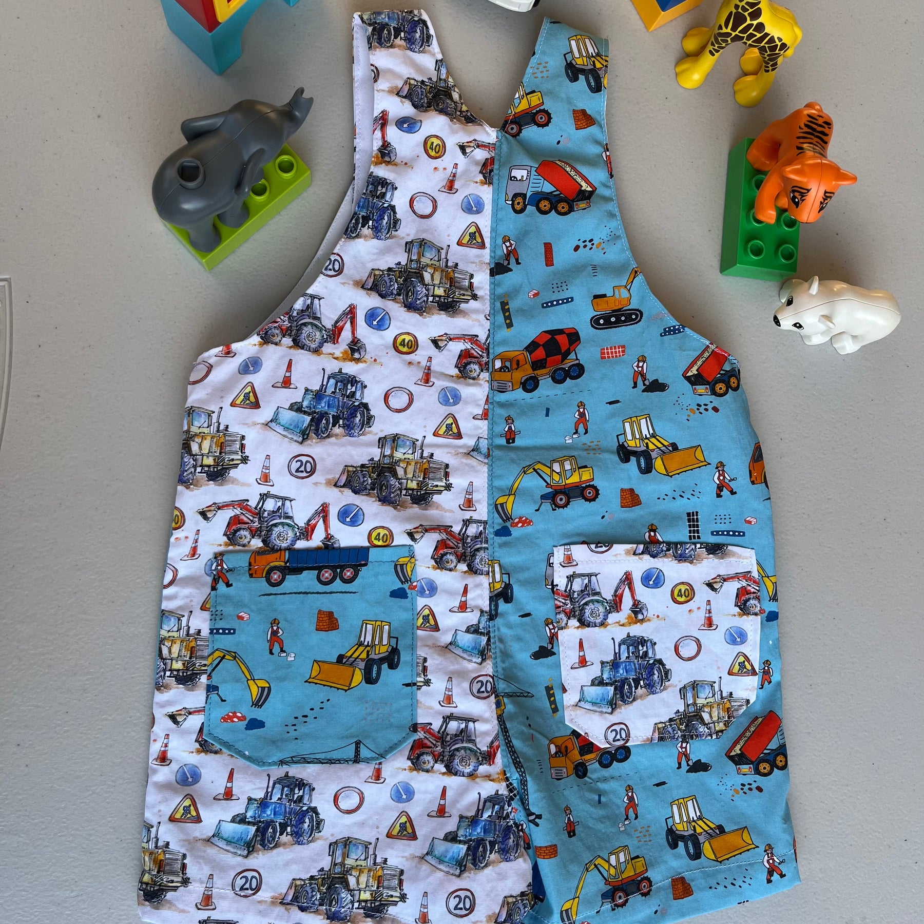 baby overalls/shorts | construction trucks