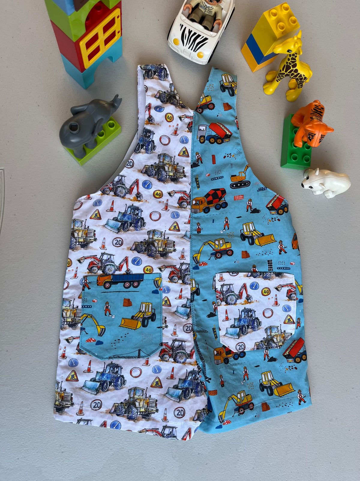 baby overalls/shorts | construction trucks