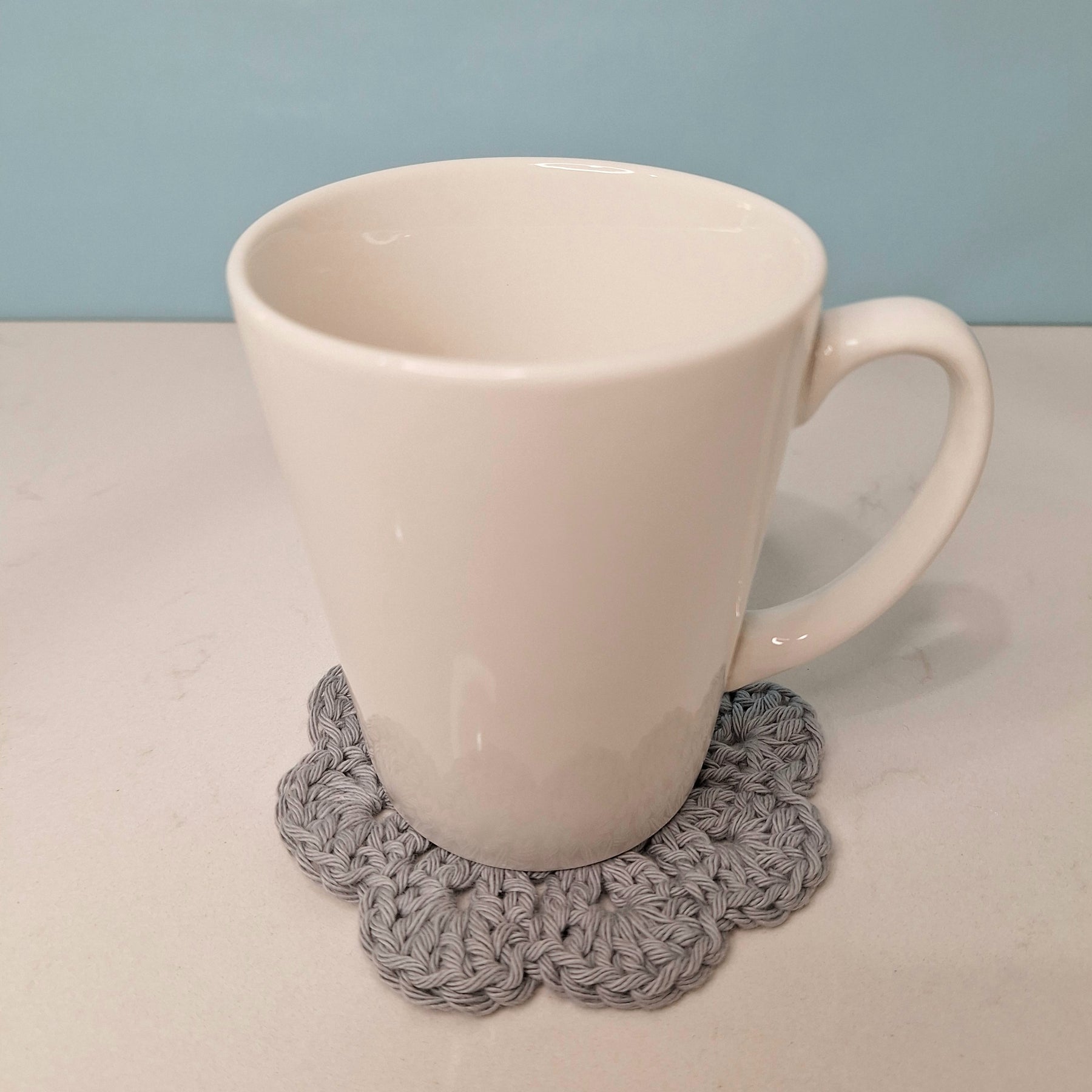 crocheted coasters Mandala style in a set of four