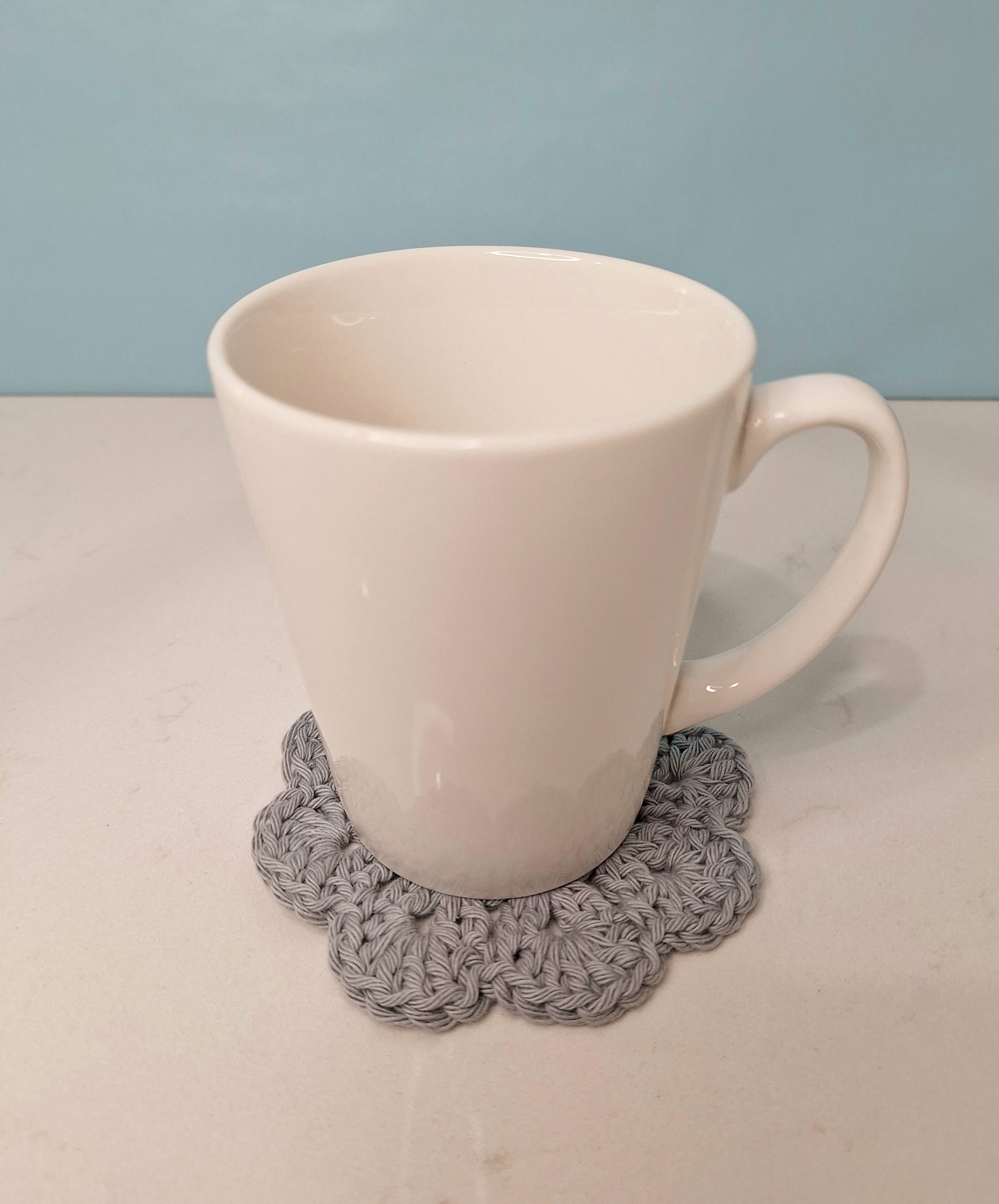 crocheted coasters Mandala style in a set of four