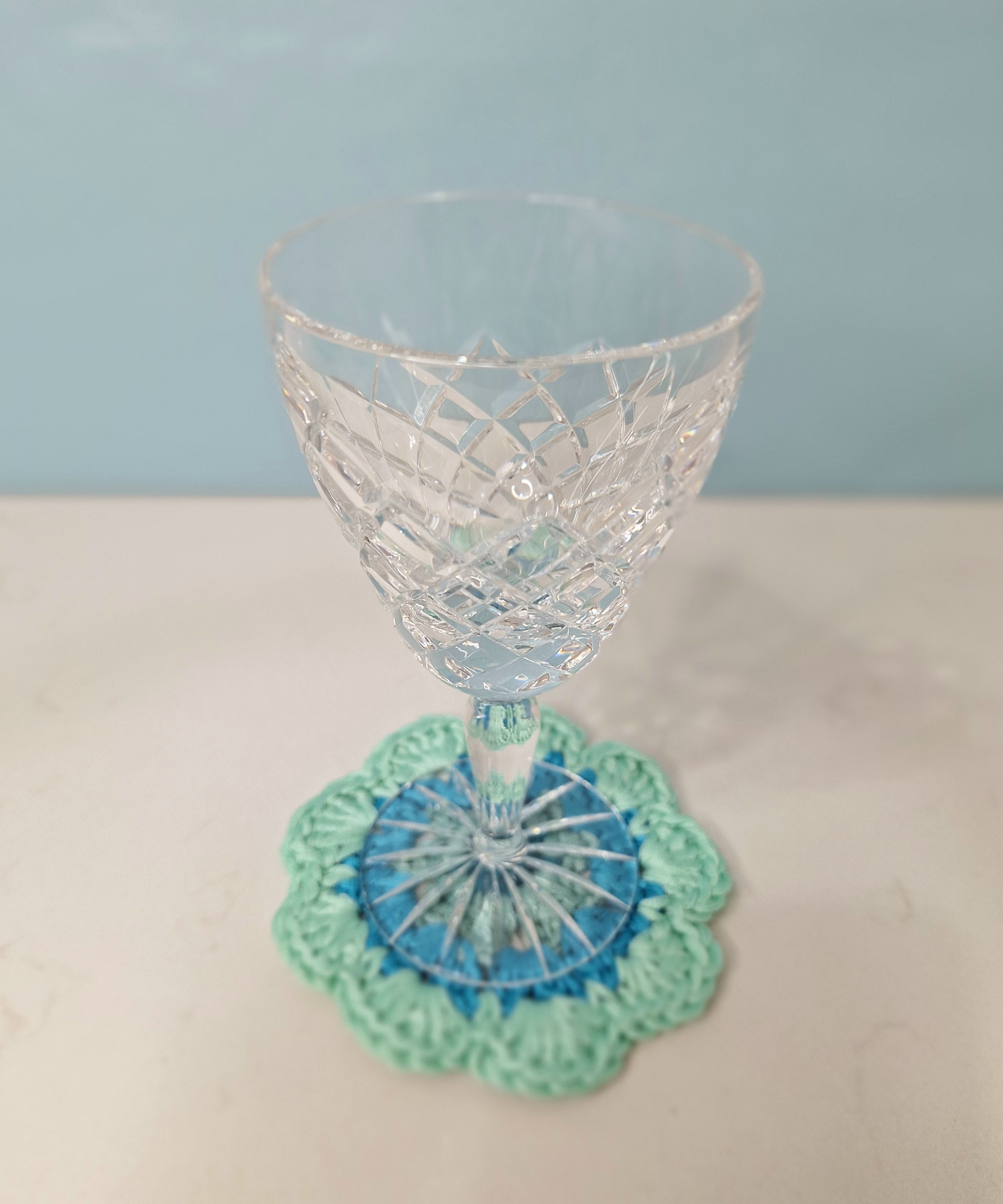 crocheted coasters Mandala style in a set of four