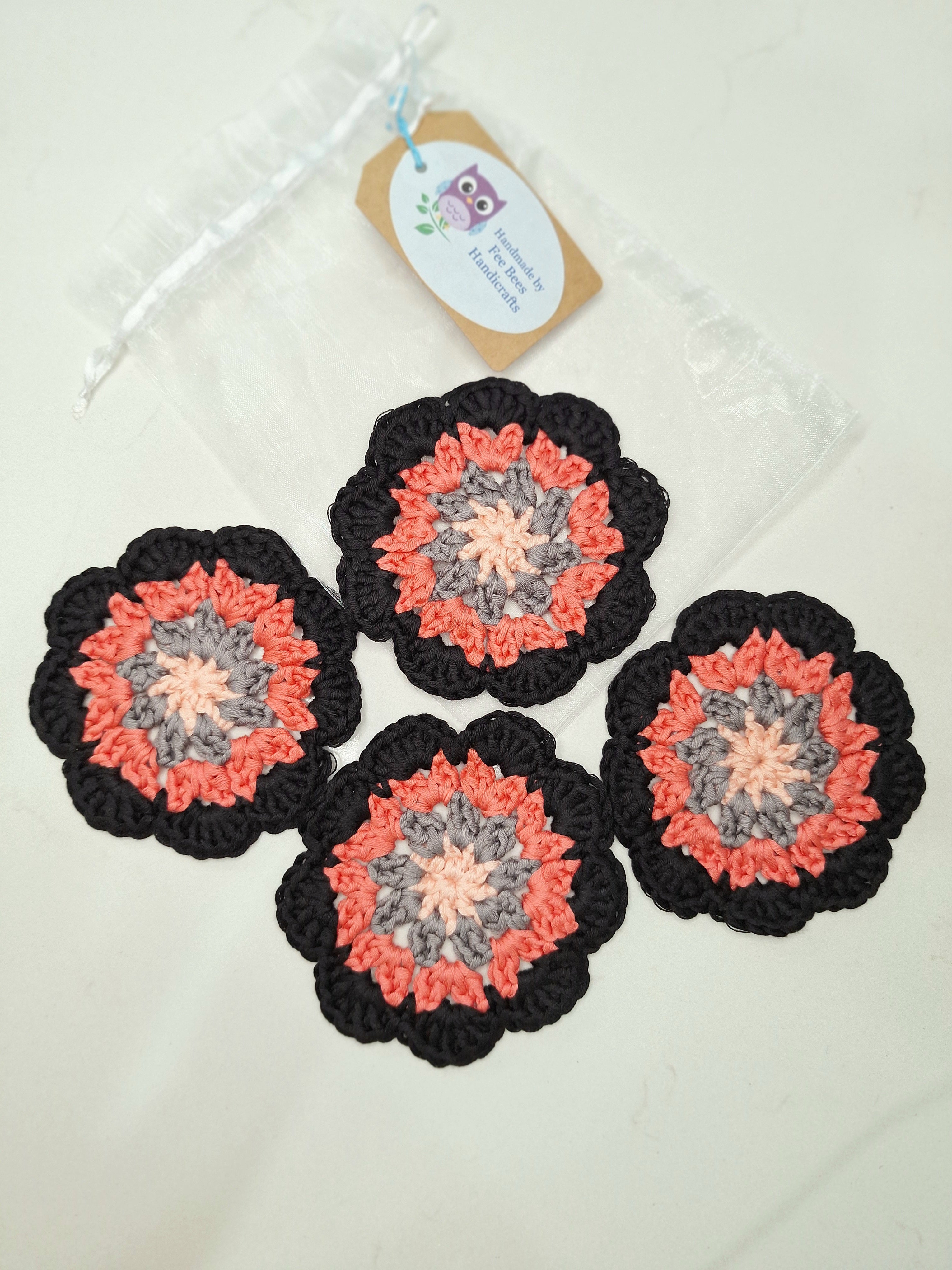 crocheted coasters Mandala style in a set of four