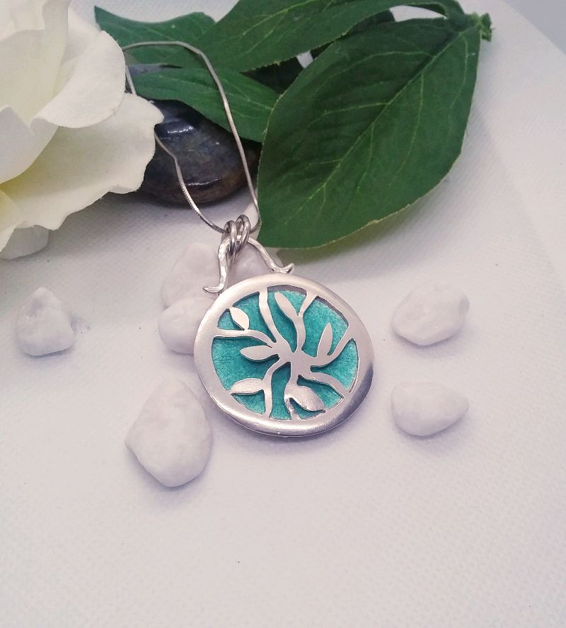 Sterling Silver circular pendant with enamelled silver