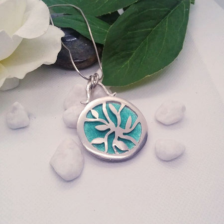 Sterling Silver circular pendant with enamelled silver