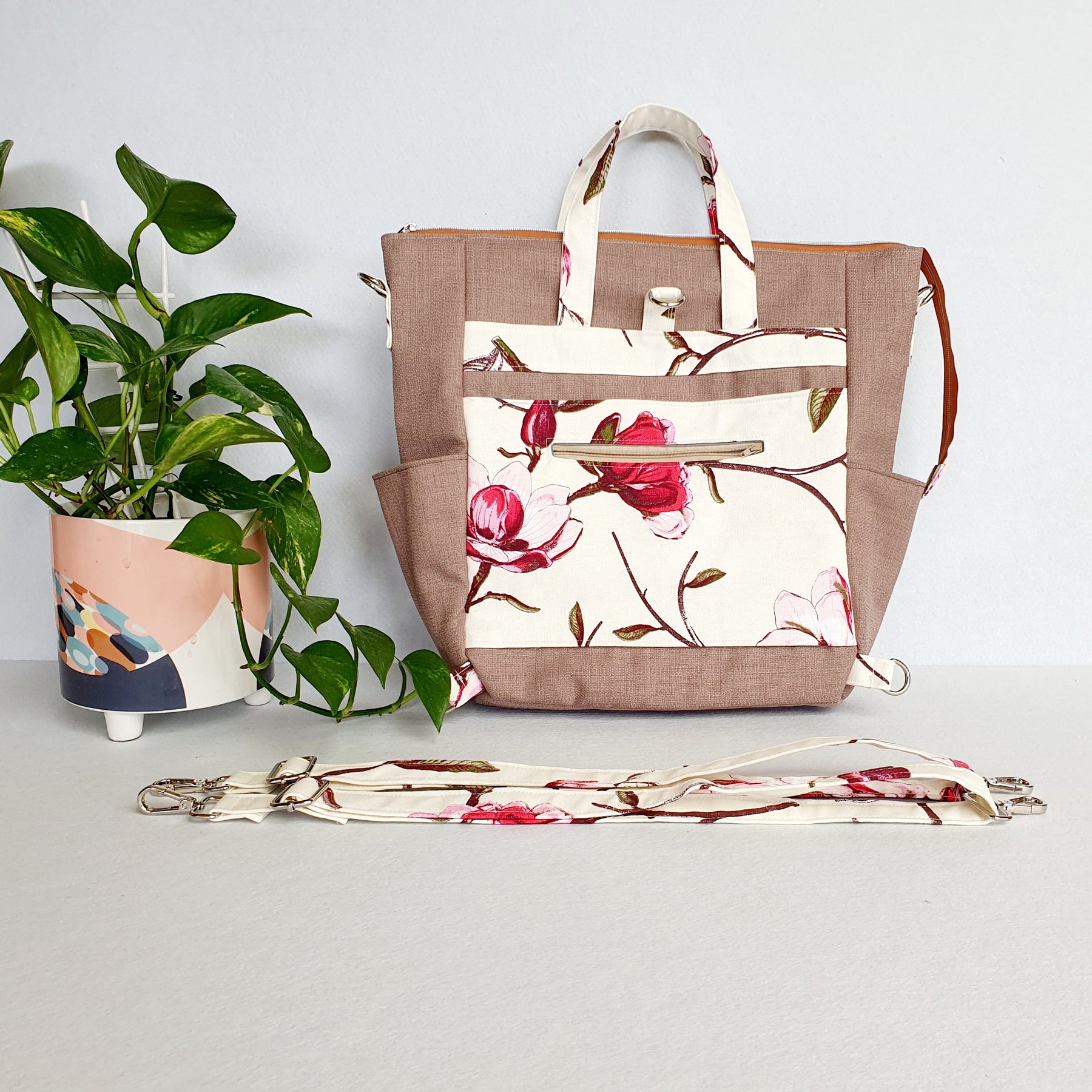 Magnolia Blossom modern bag converting from handbag into crossbody or backpack