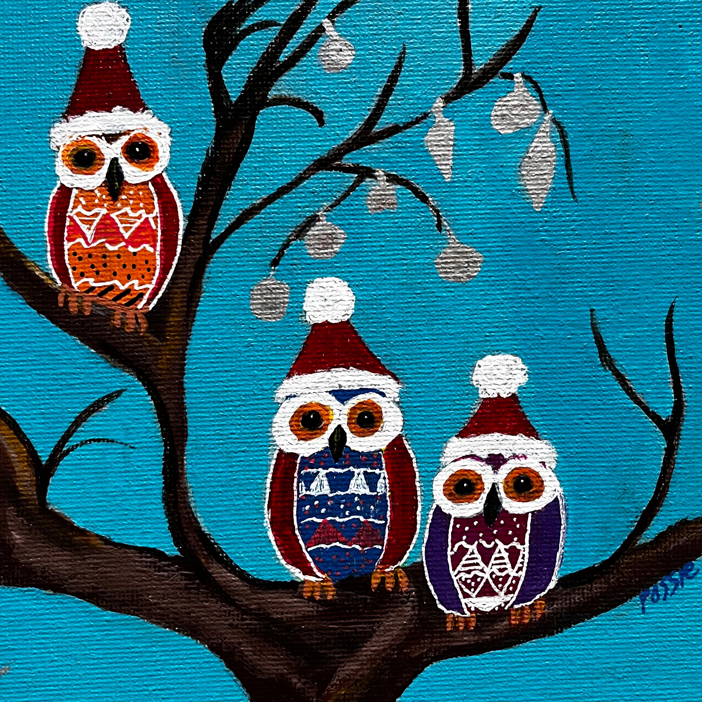 Owls in christmas hats