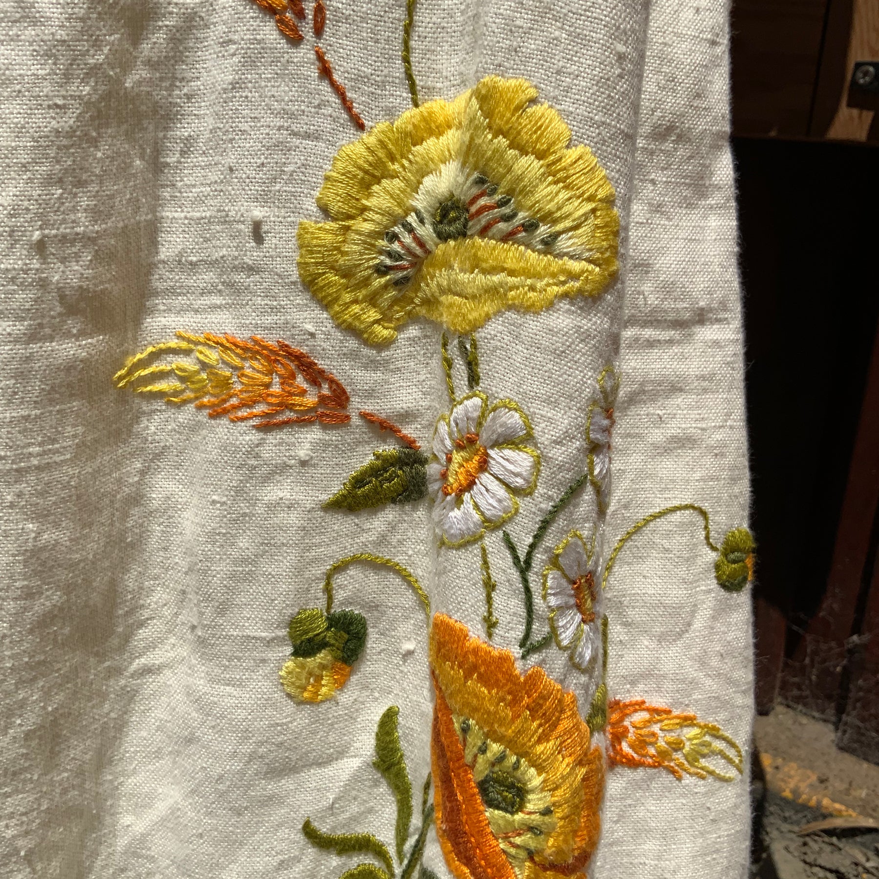 Upcycled embroidered linen tablecloth into "Flower Power" Bell Bottoms