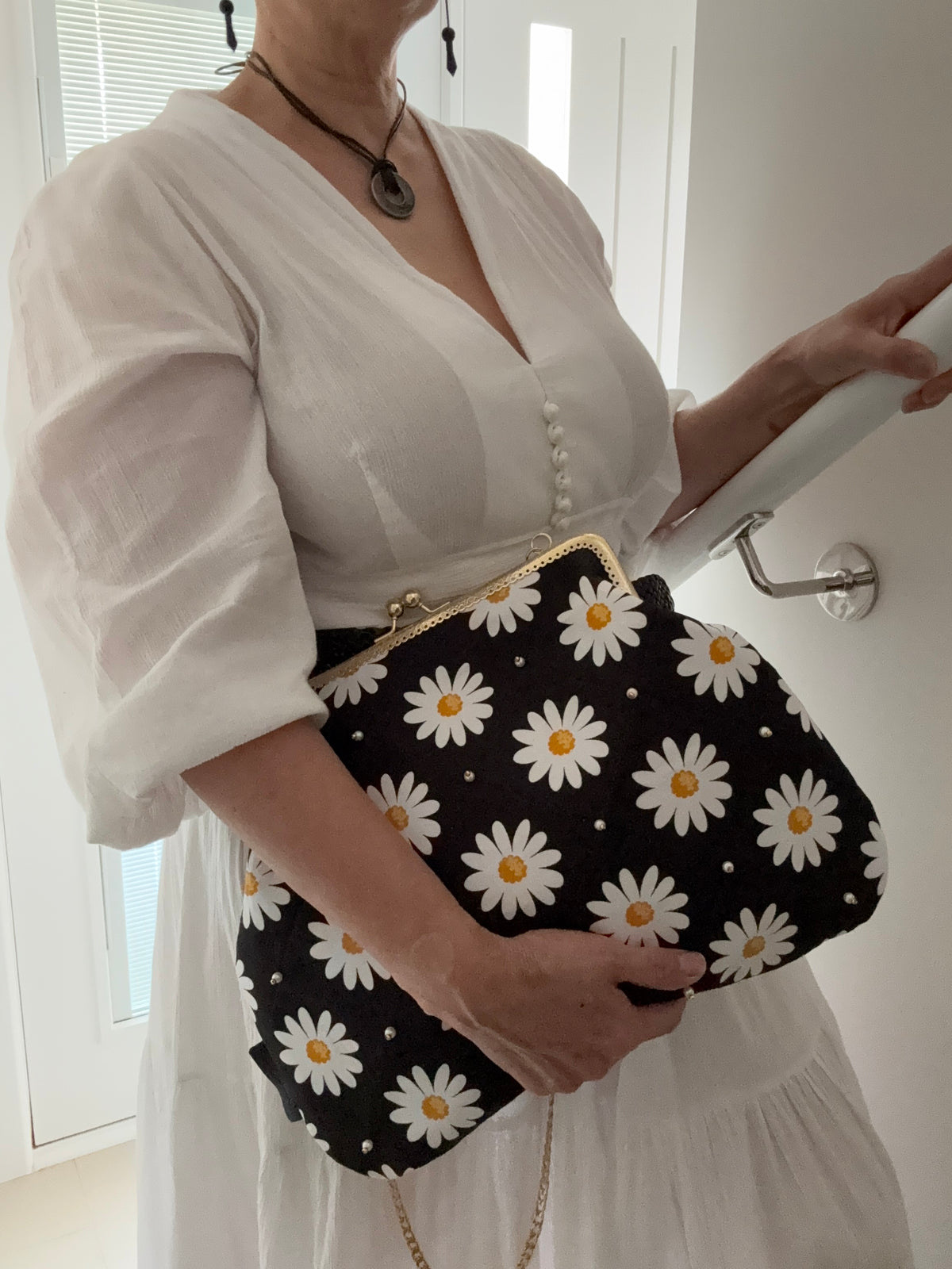 ‘Field of daisies’ metal frame purse