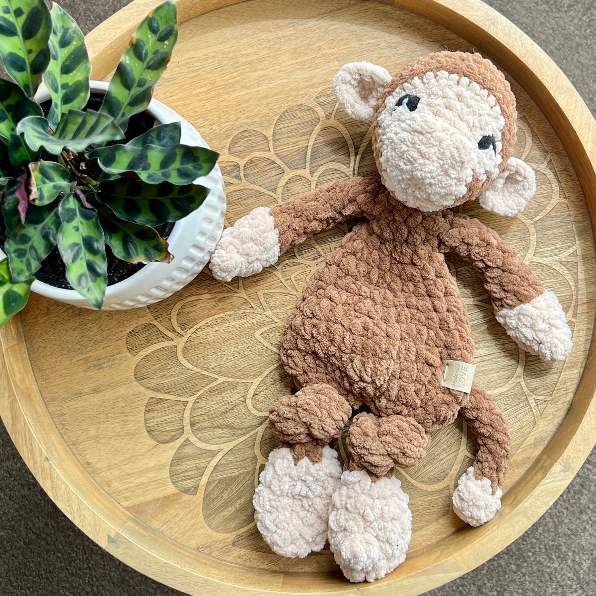 Handmade modern crochet toy monkey lovey snuggler.