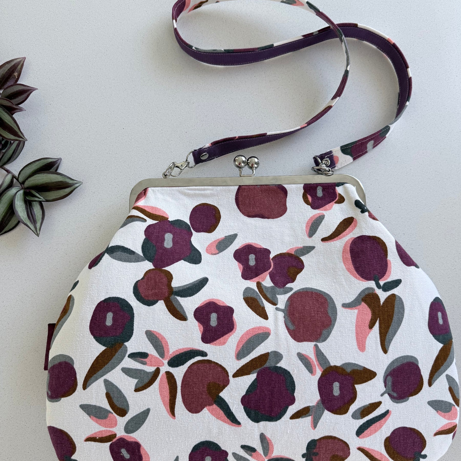 ‘Plum’ metal frame oversized purse