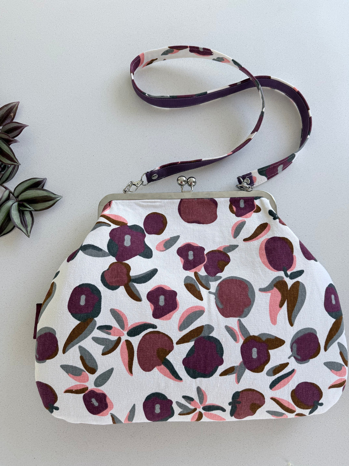 ‘Plum’ metal frame oversized purse