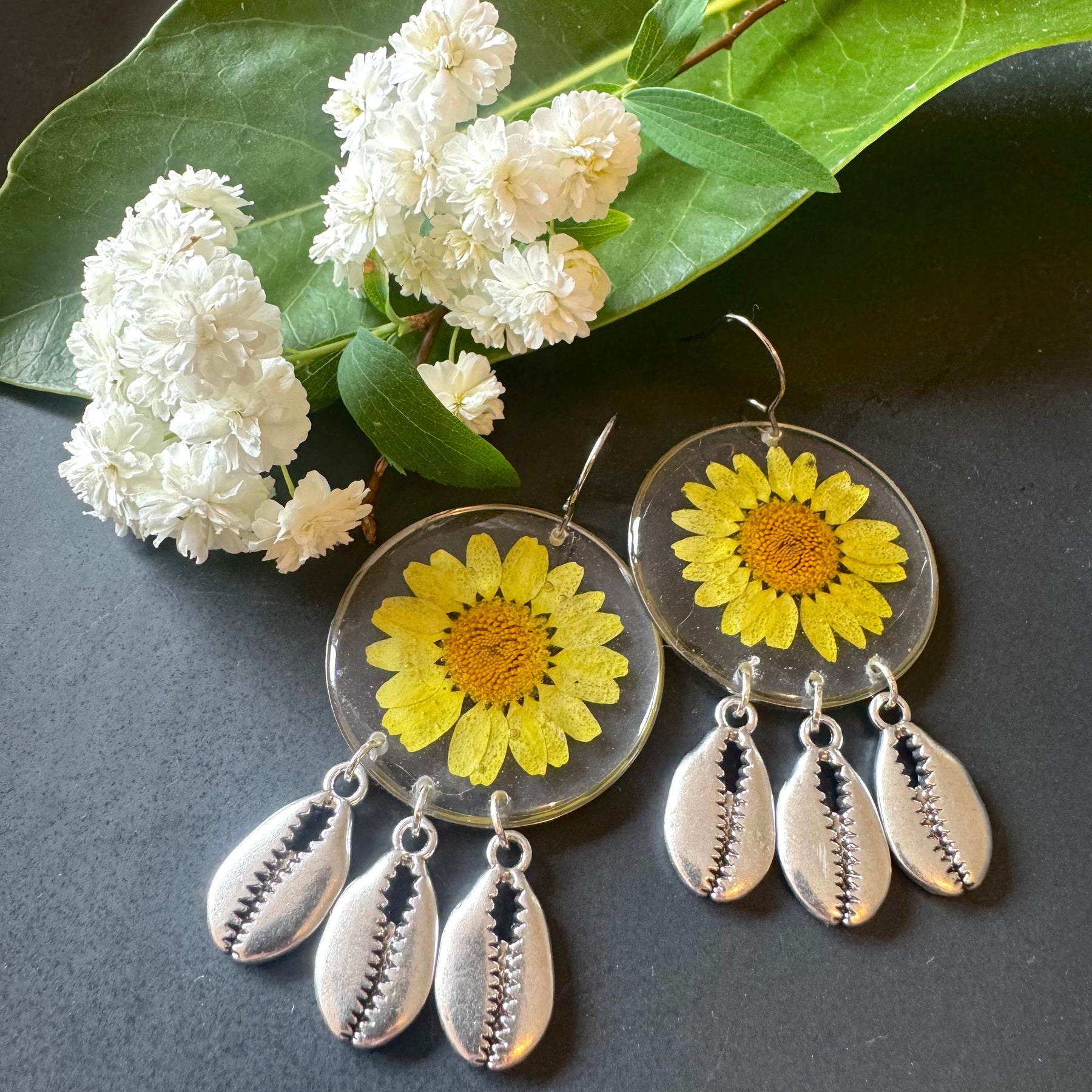 Yellow daisy and shell resin earrings