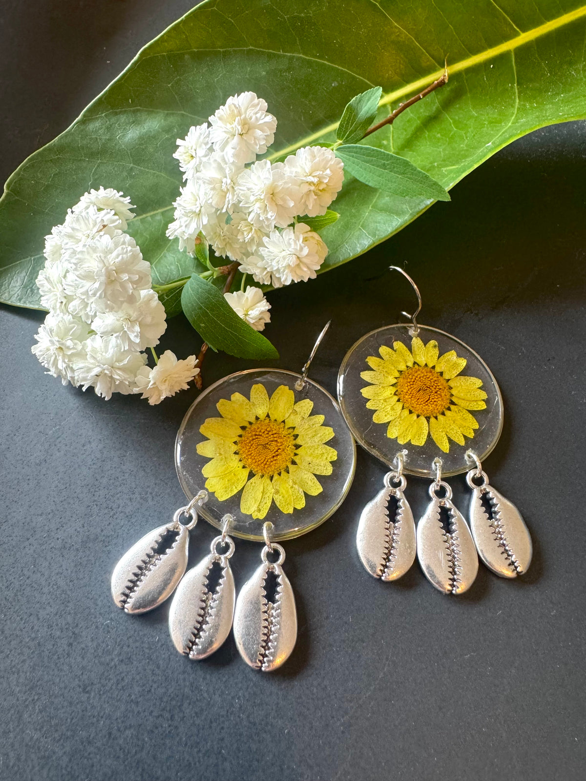 Yellow daisy and shell resin earrings