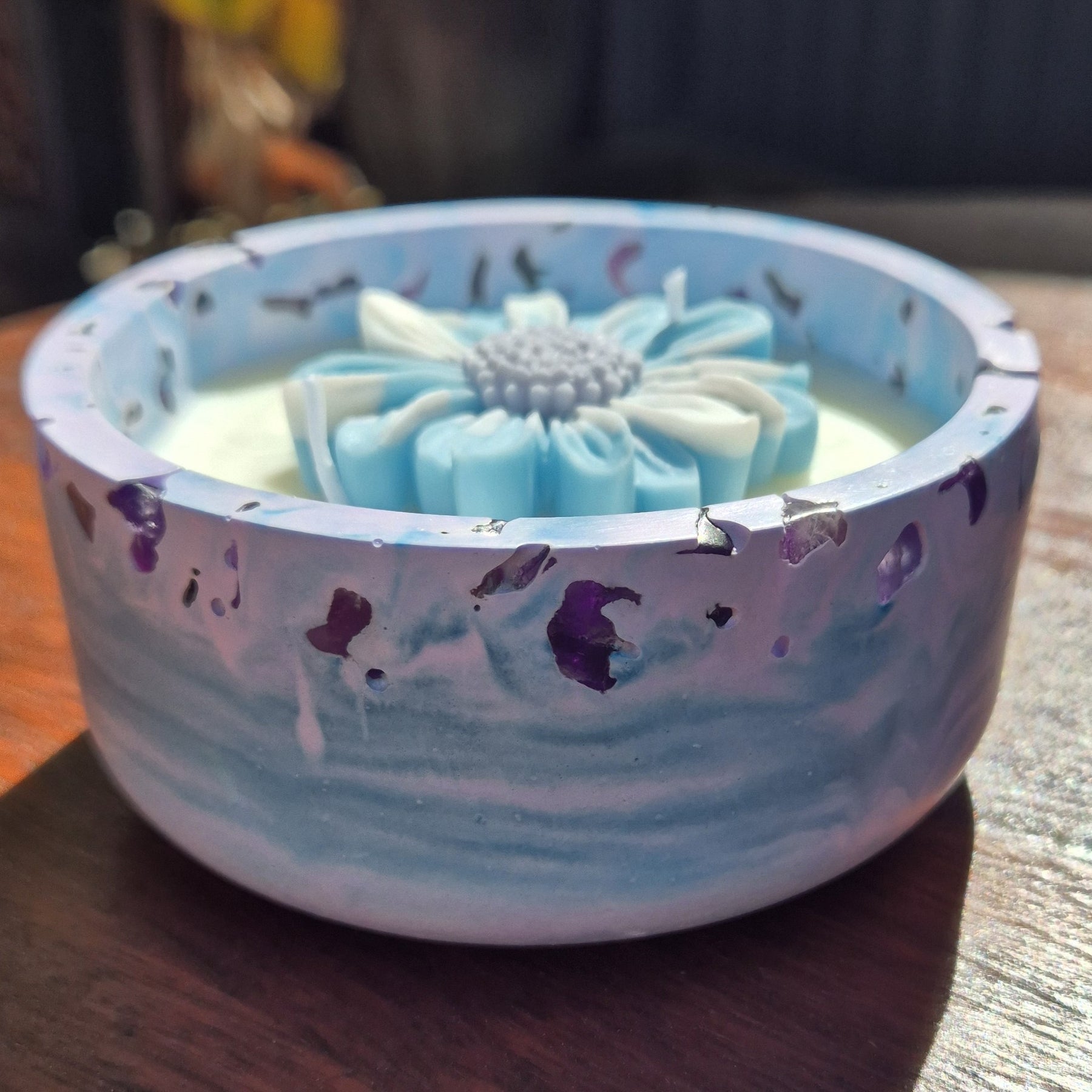 Round blue and purple concrete bowl candle with amethyst stones