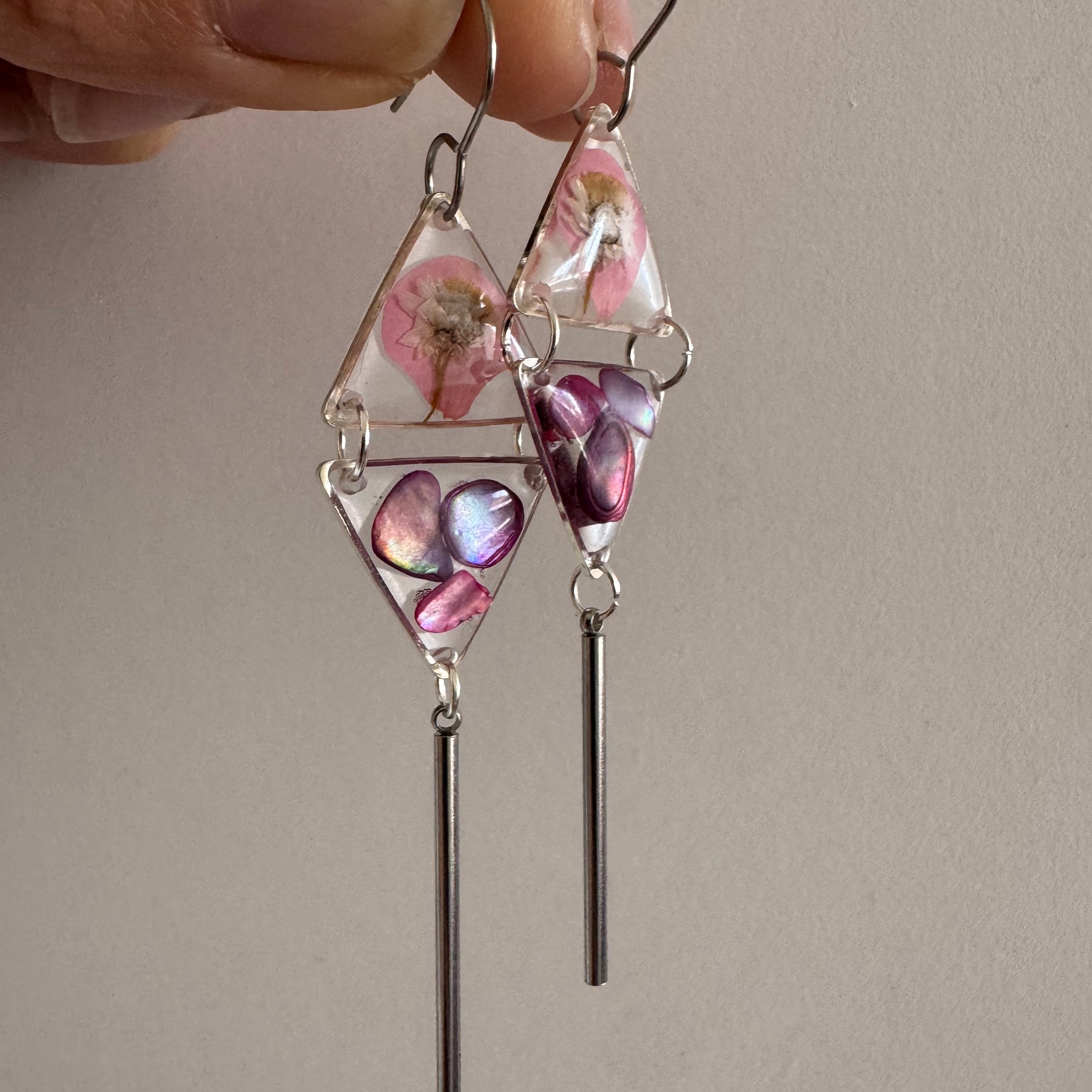 Double triangle cowrie shell and pressed flower resin earrings