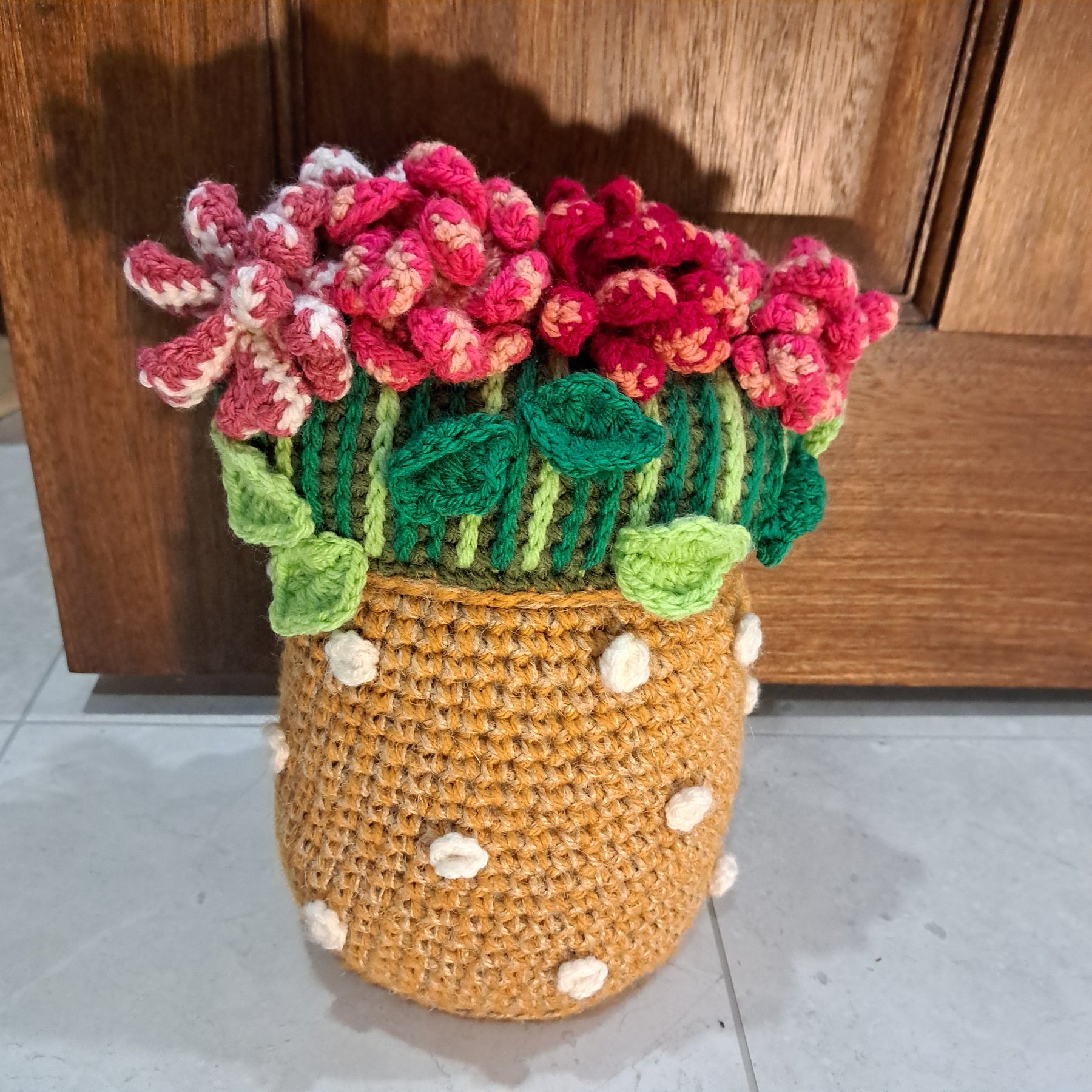 Handmade Crochet doorstop pink flowers in yellow vase