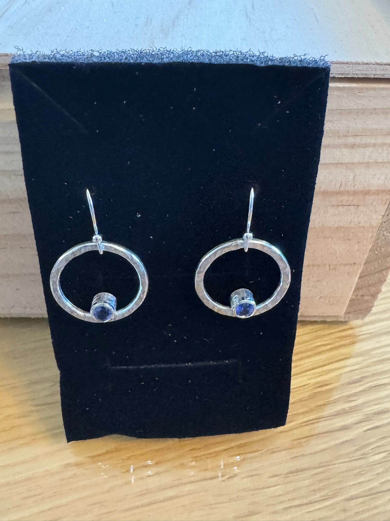Dazzling iolite circle hammered earrings