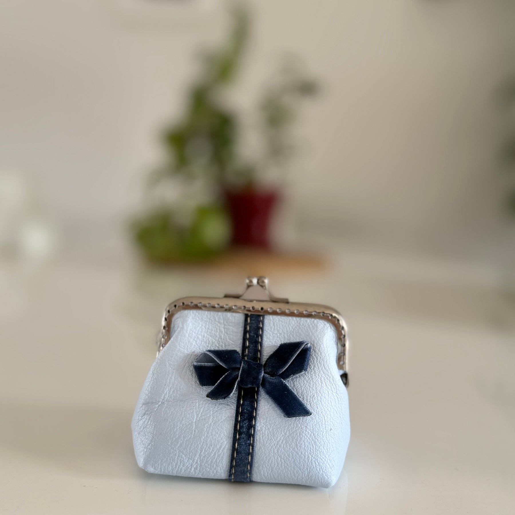 Coin purse with bow accent