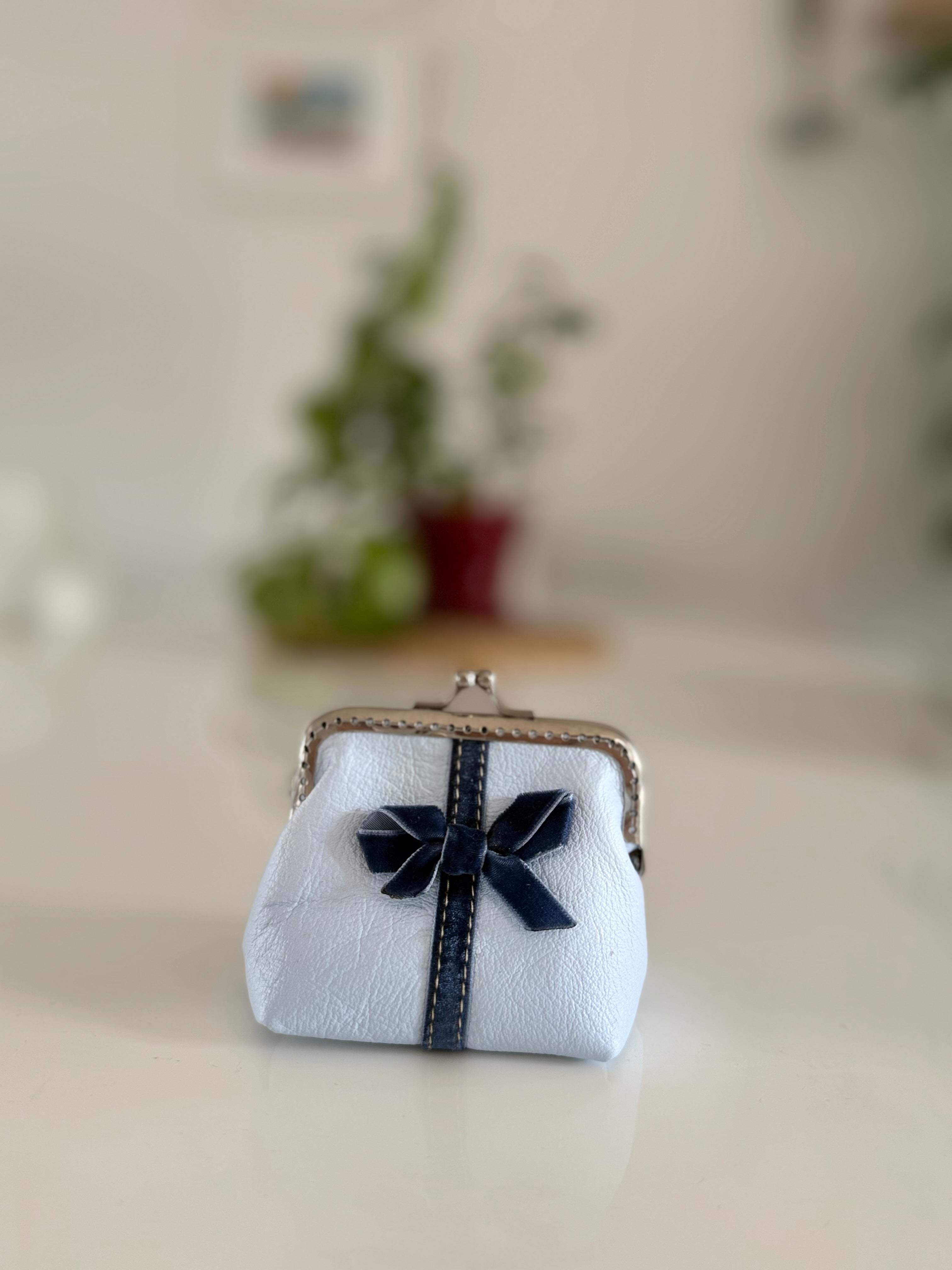 Coin purse with bow accent