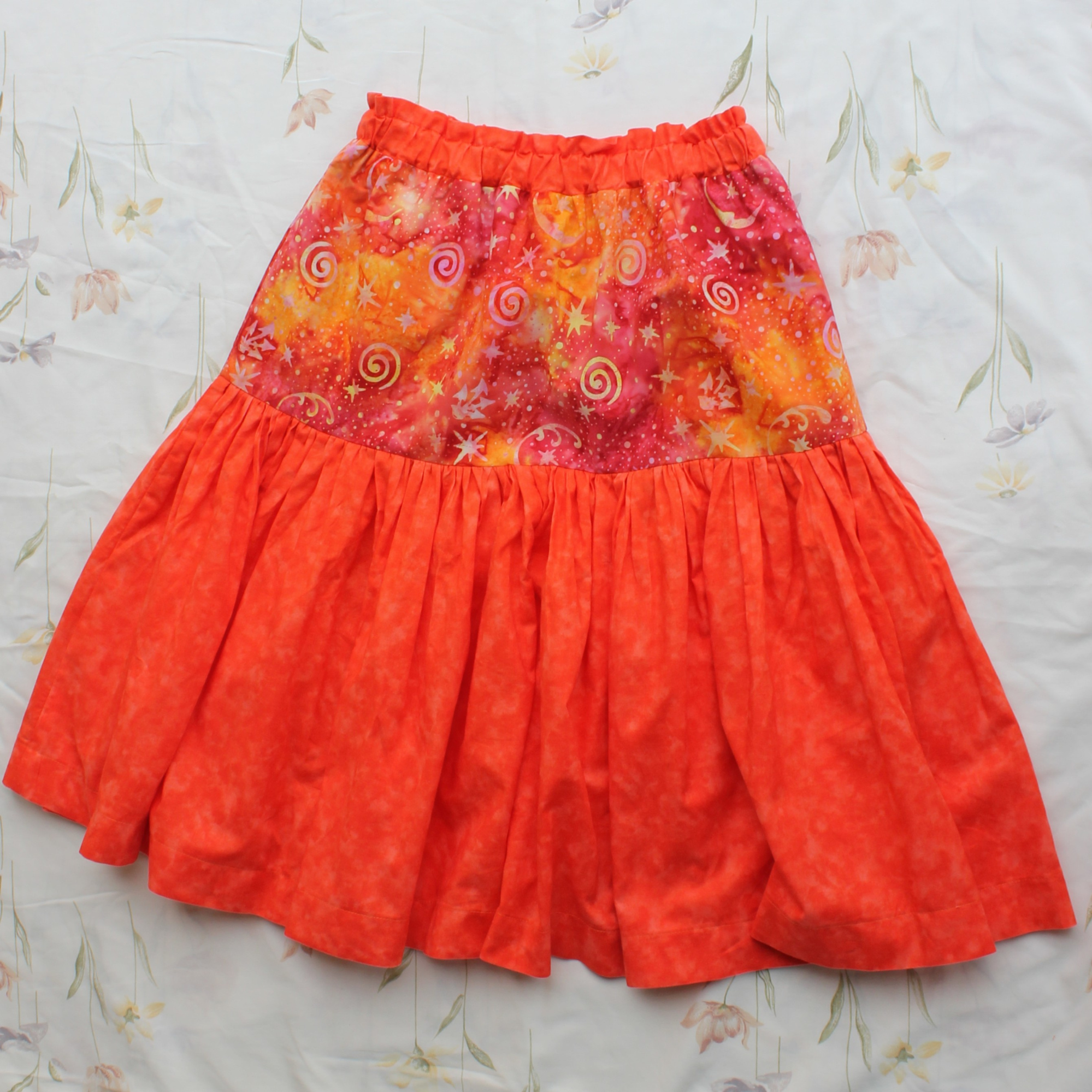Womens Size Small, Mid Skirt, Orange/Spirals Galaxy.