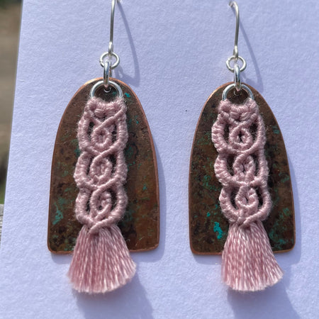 Pink macrame thread on patinated copper