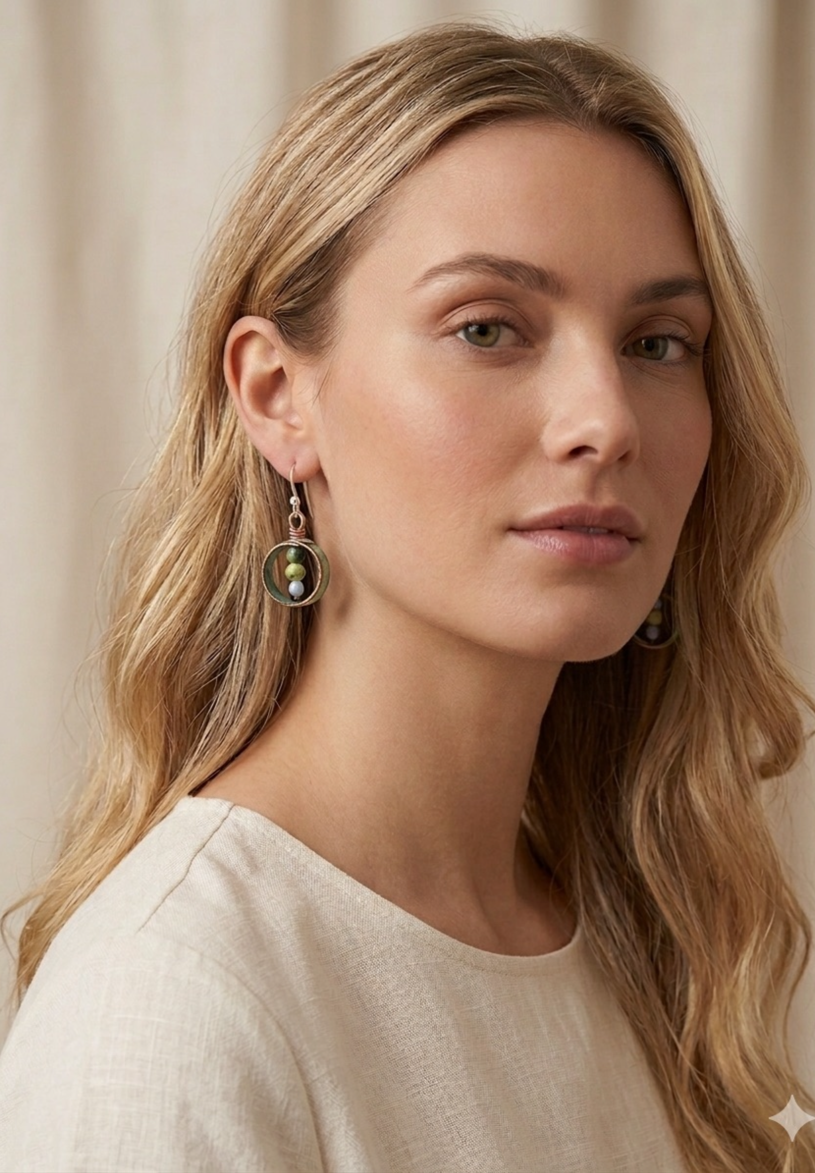 Teal gold and white enamel earrings with gemstone beads.