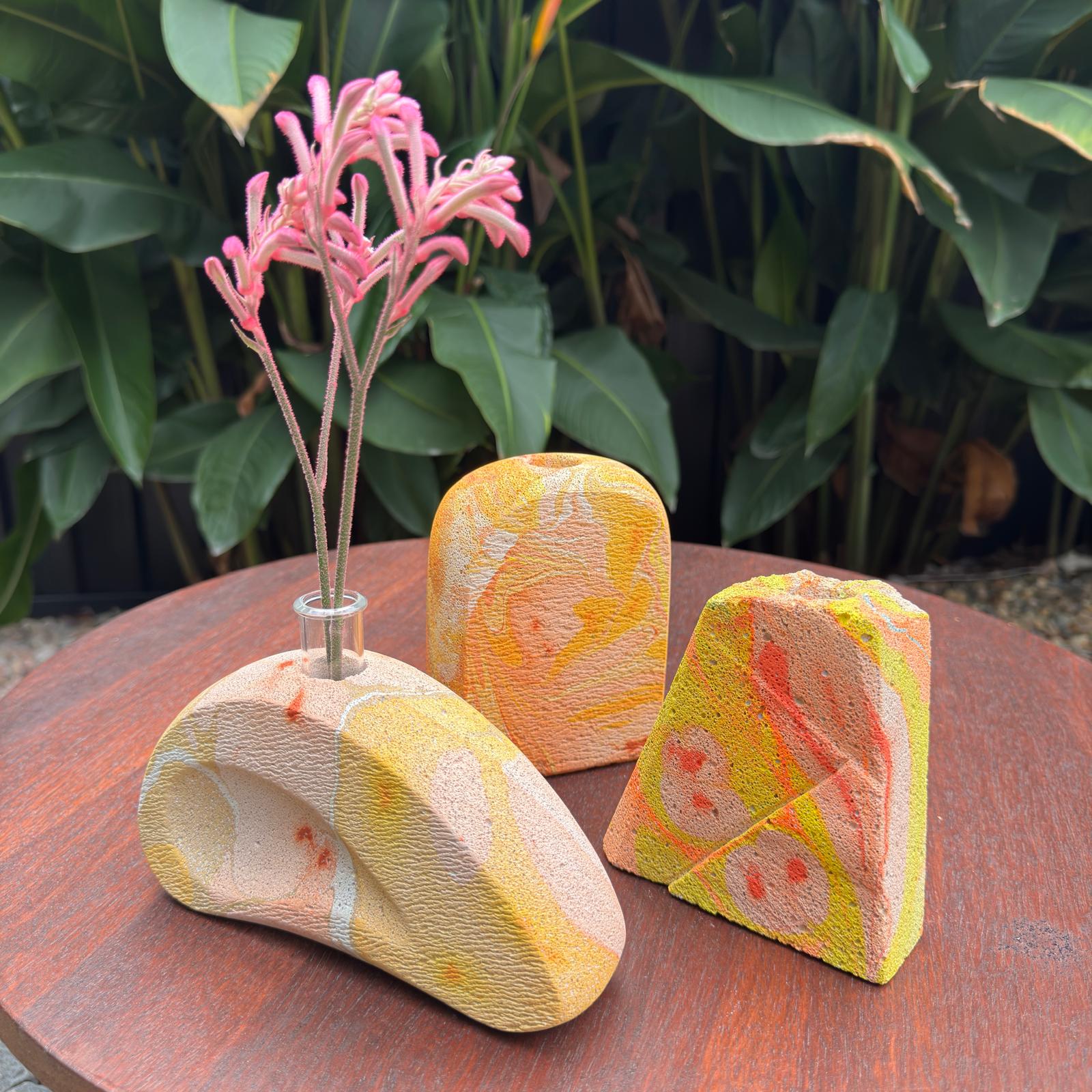 Hand sculpted concrete test tube vase in sunset colours