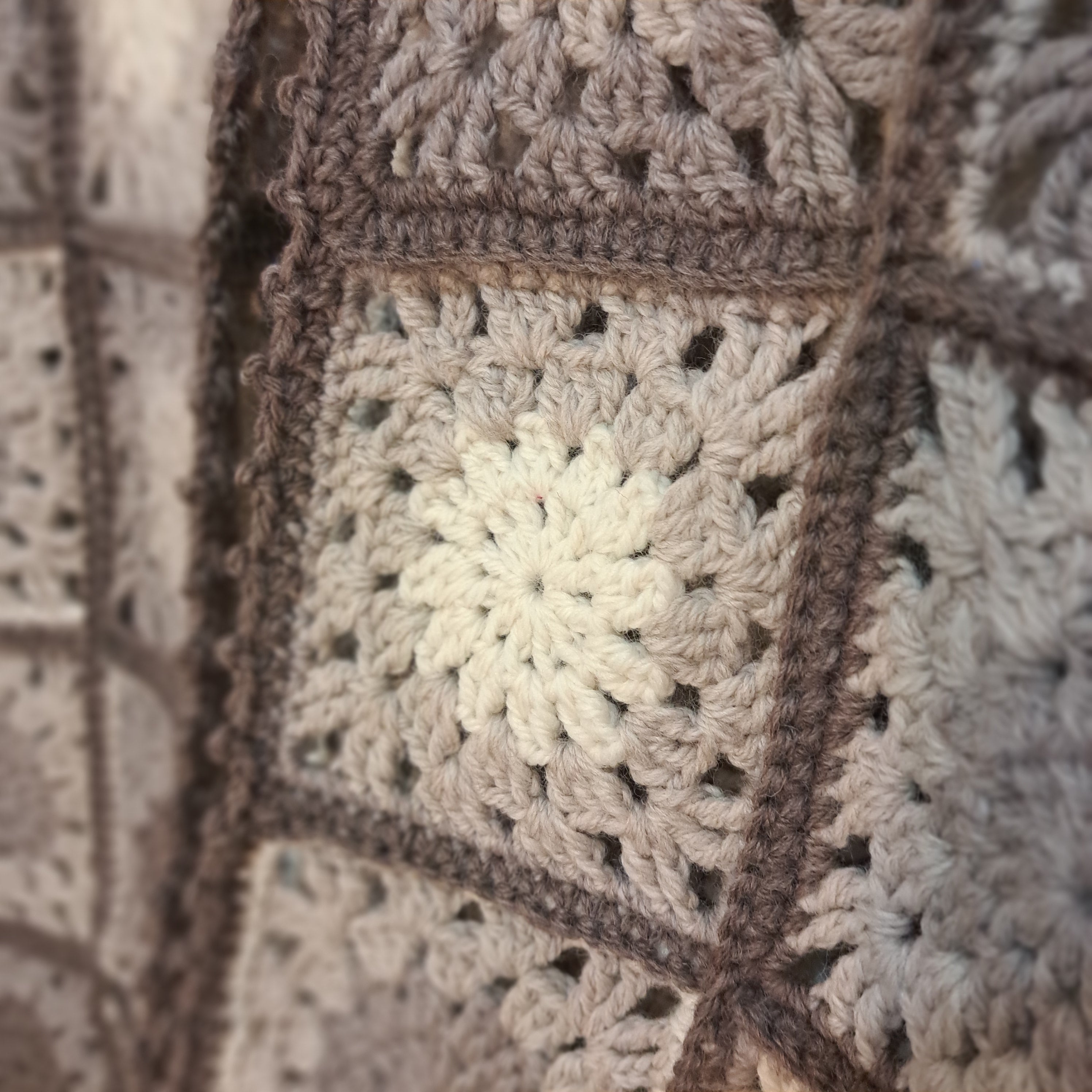 Crochet woollen vest in granny squares